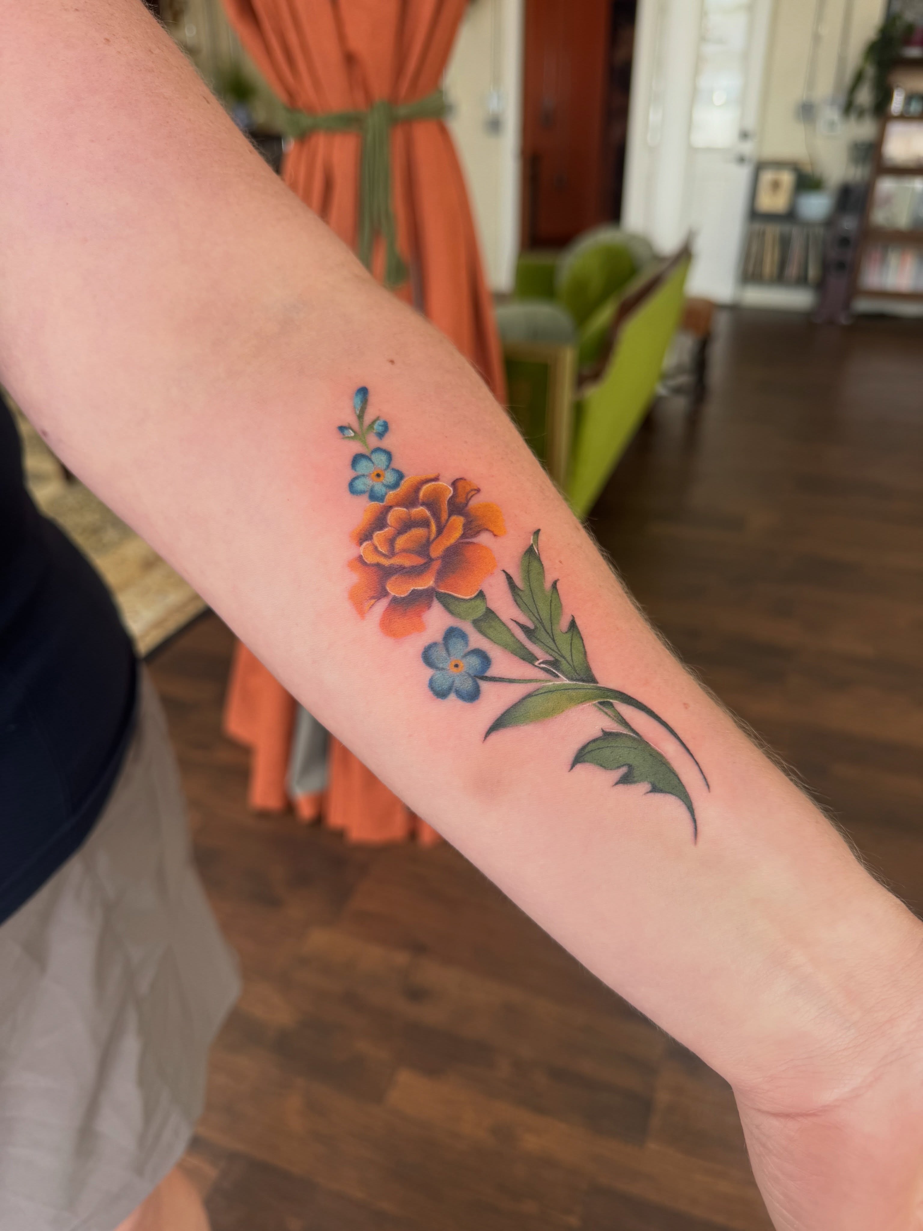 Floral arrangement realism tattoo on the forearm by Alisa (Li) Affatato ๐ผ