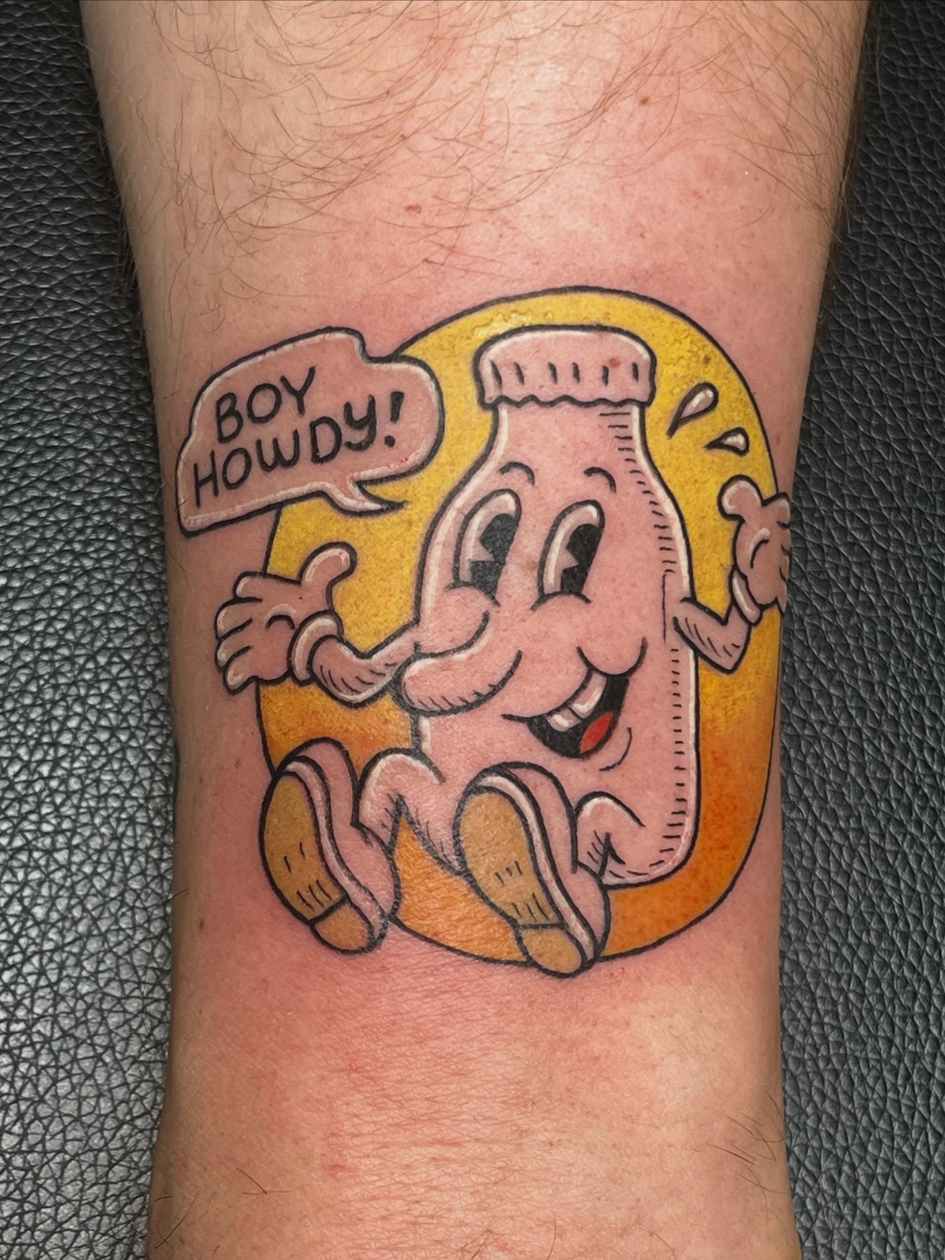 Peanut butter jar character American traditional tattoo on the forearm by Elle Miller