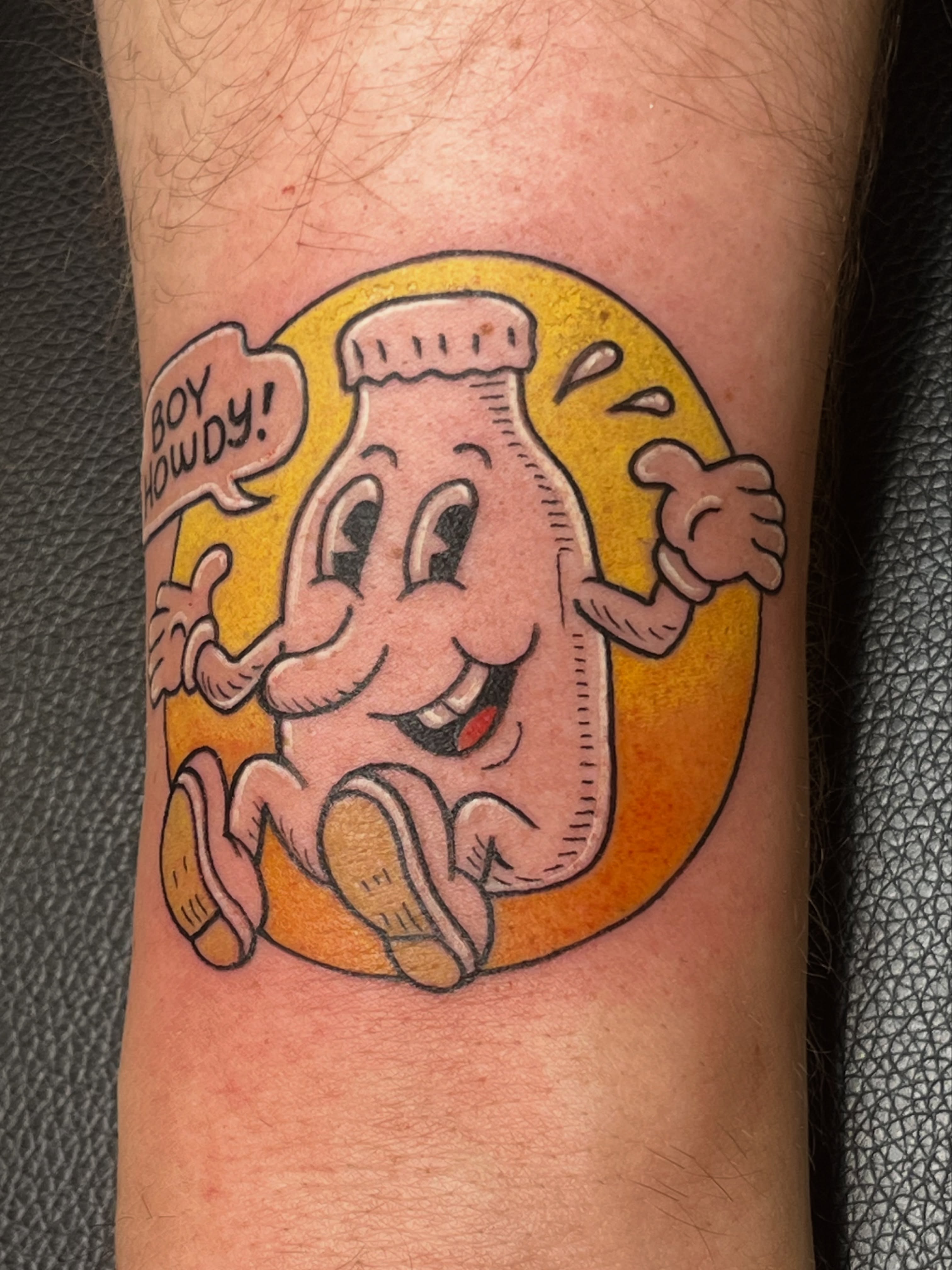 Pickle character illustrative tattoo on the forearm by Elle Miller
