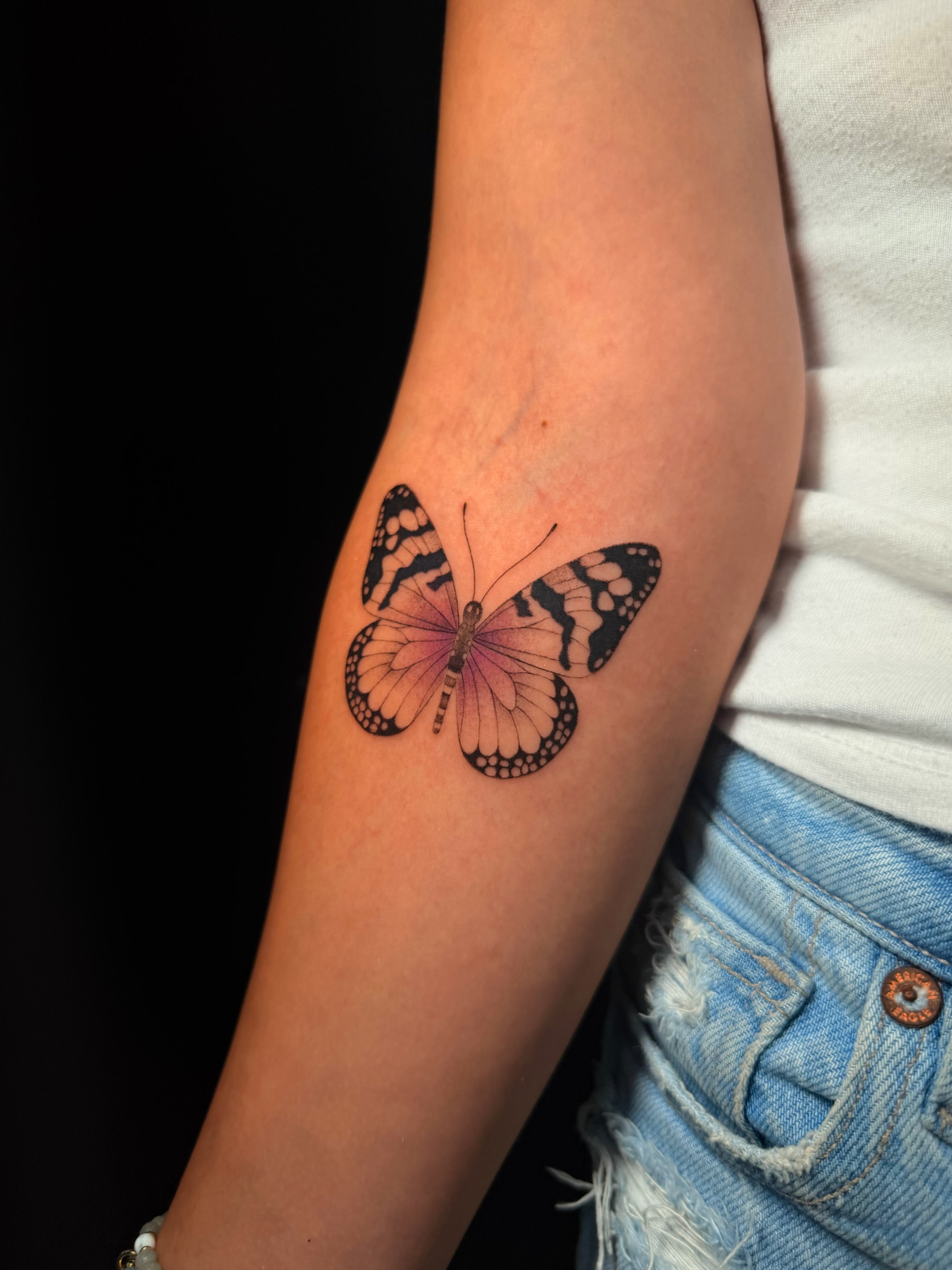 Butterfly realism tattoo on the forearm by Frida Tattooista