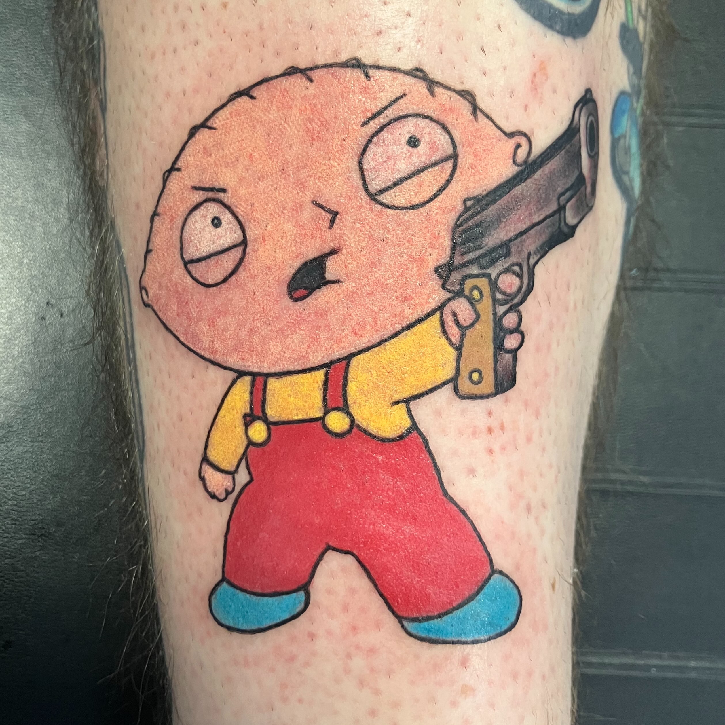 Stewie Griffin dotwork tattoo on the forearm by Bryant Johnson