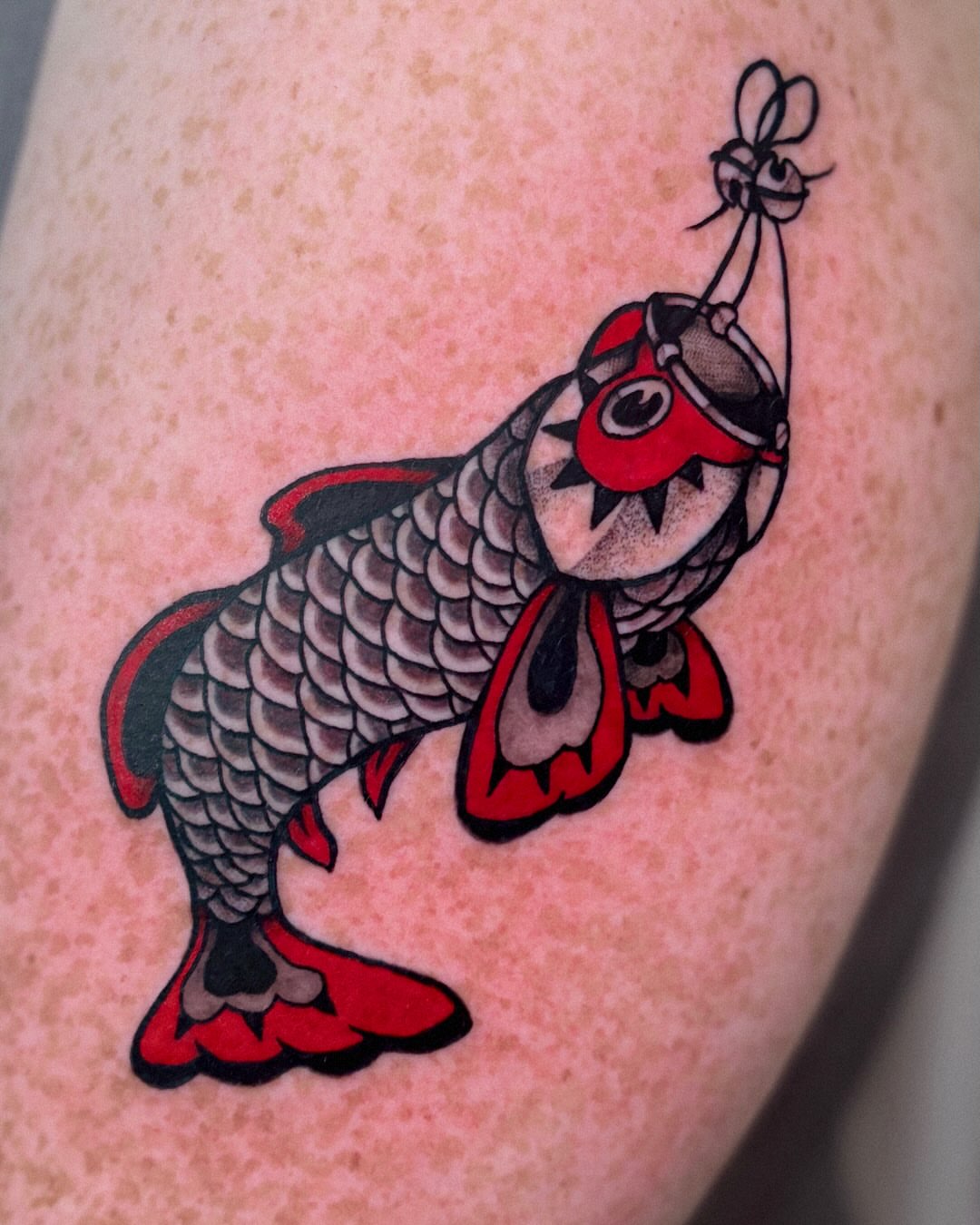 Koi fish American traditional tattoo on the thigh by Kal