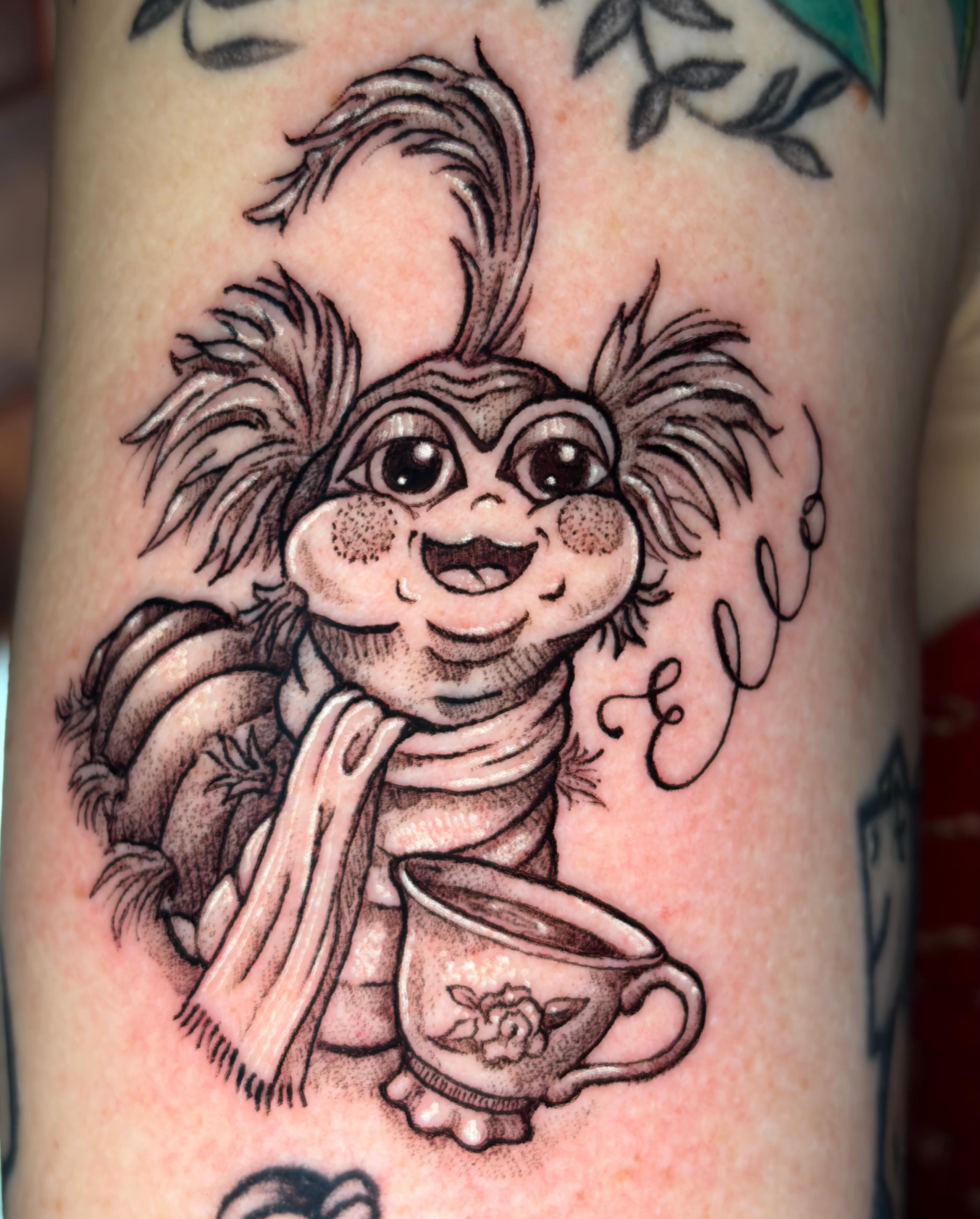 Gremlin realism tattoo on the forearm by Sam DiBiase