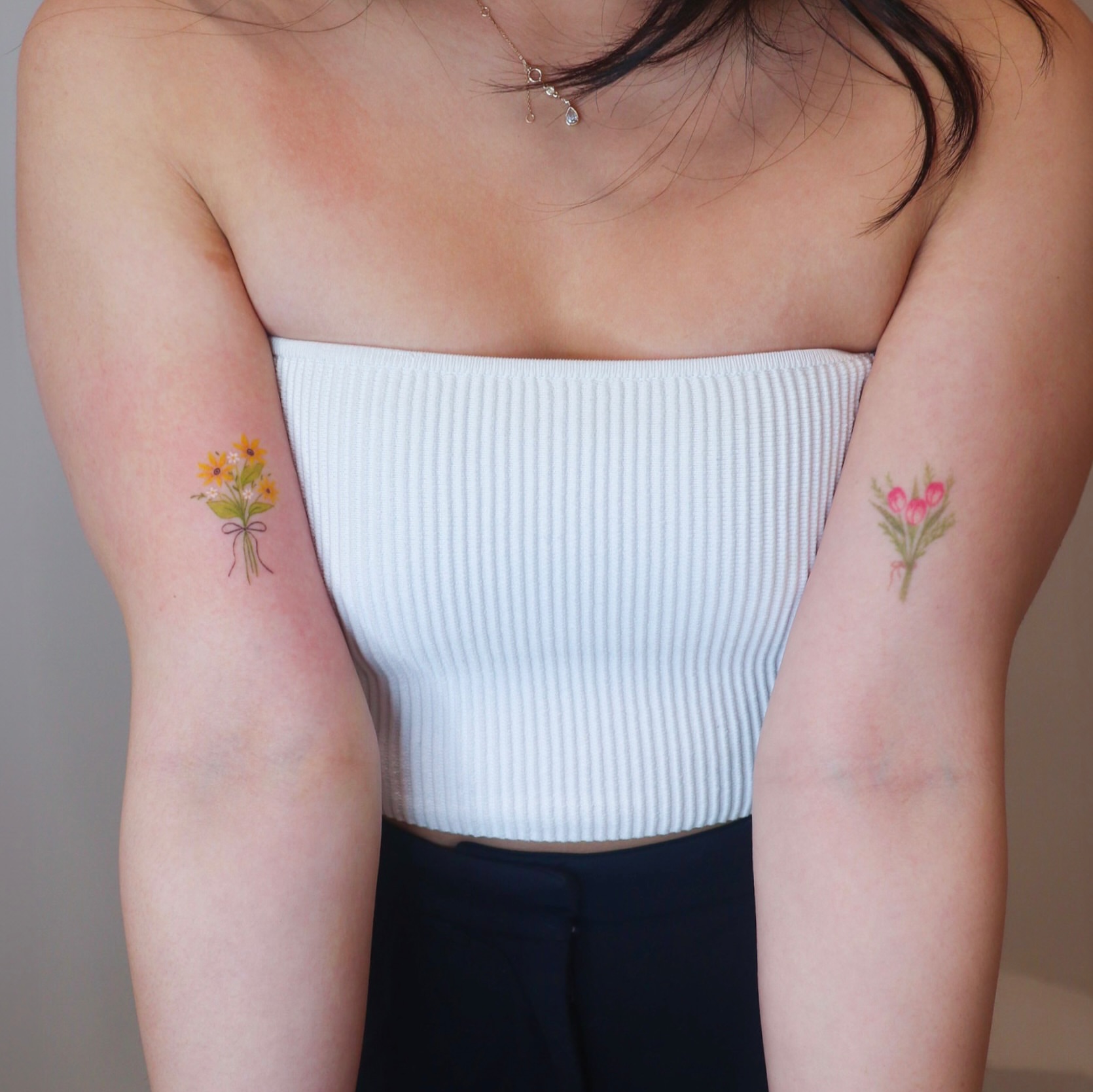 Flower bouquet dotwork tattoo on the forearm by Bay