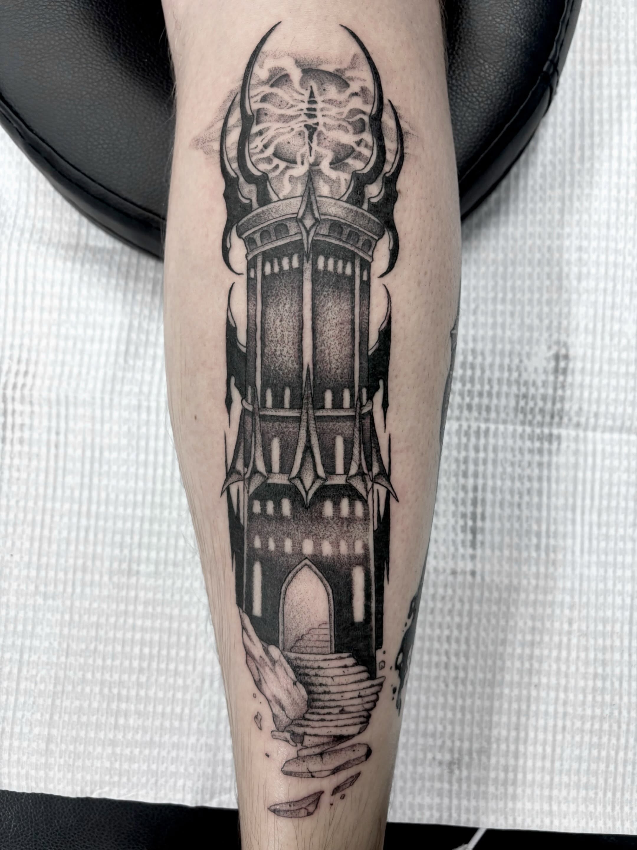 Castle ruins dotwork tattoo on the forearm by Zoe D