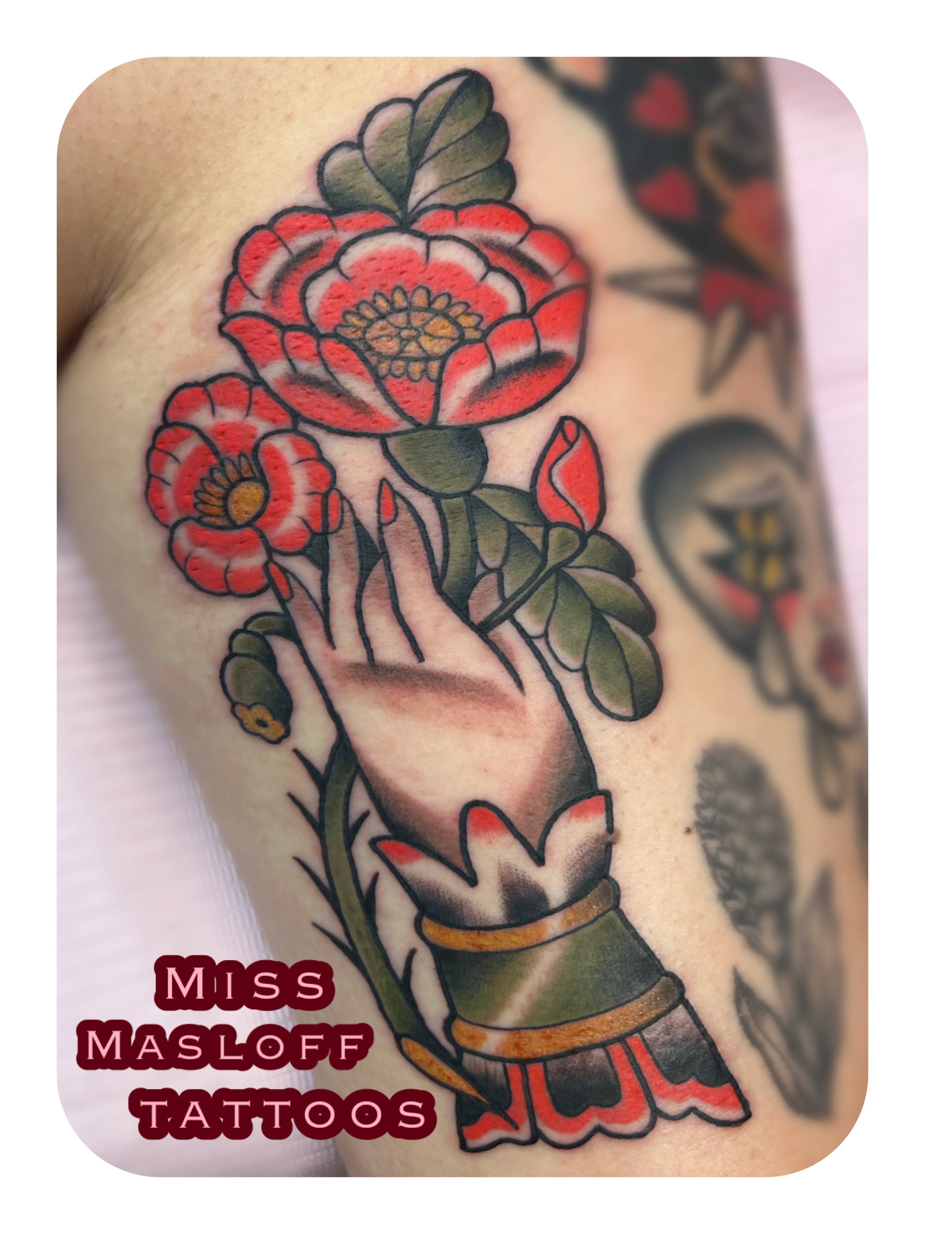 Hand holding flowers American traditional tattoo on the forearm by ๐Miss Ash Masloff (Mrs.Waritz)๐