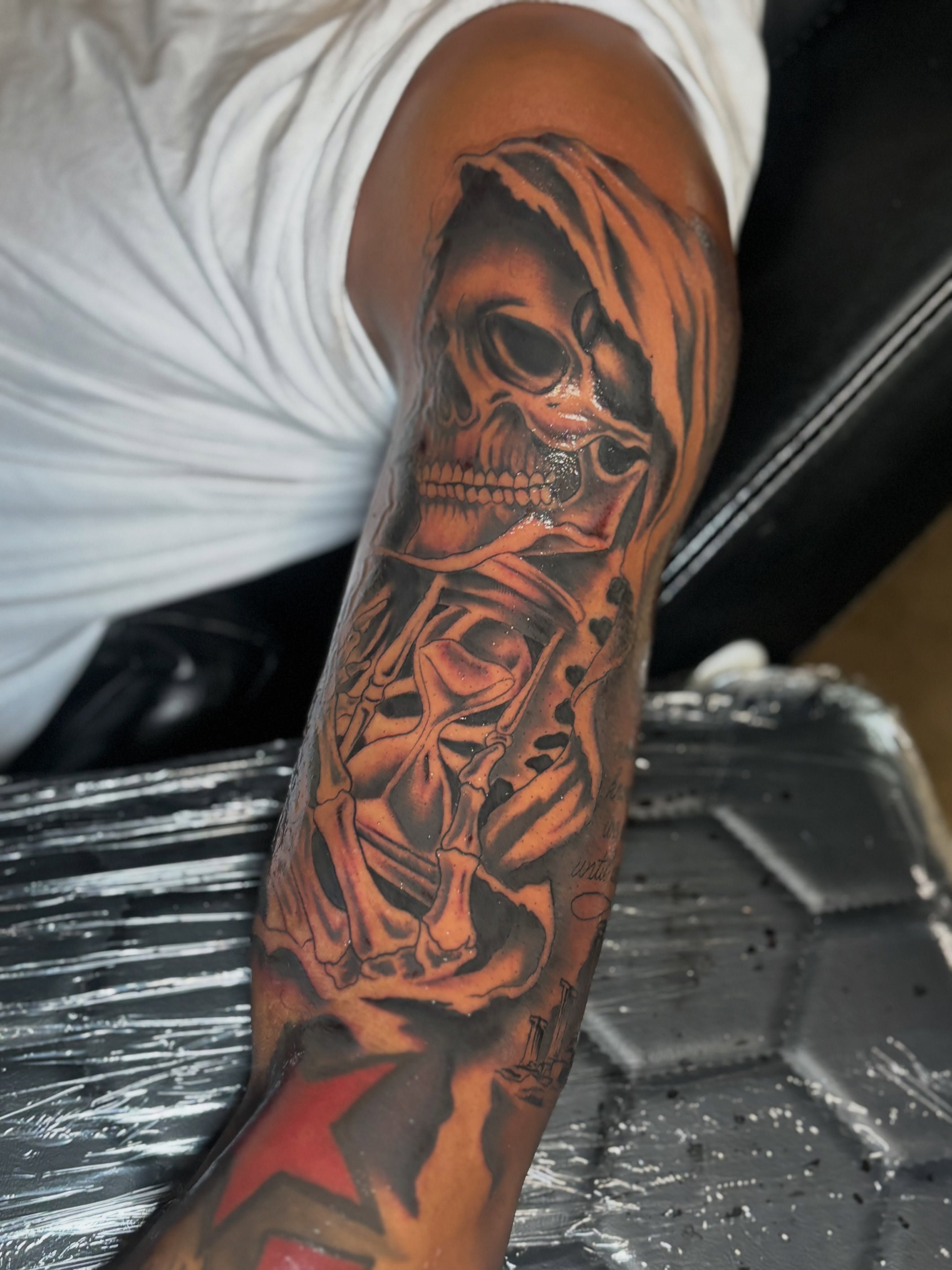 Skull realism tattoo on the forearm by Mr.K