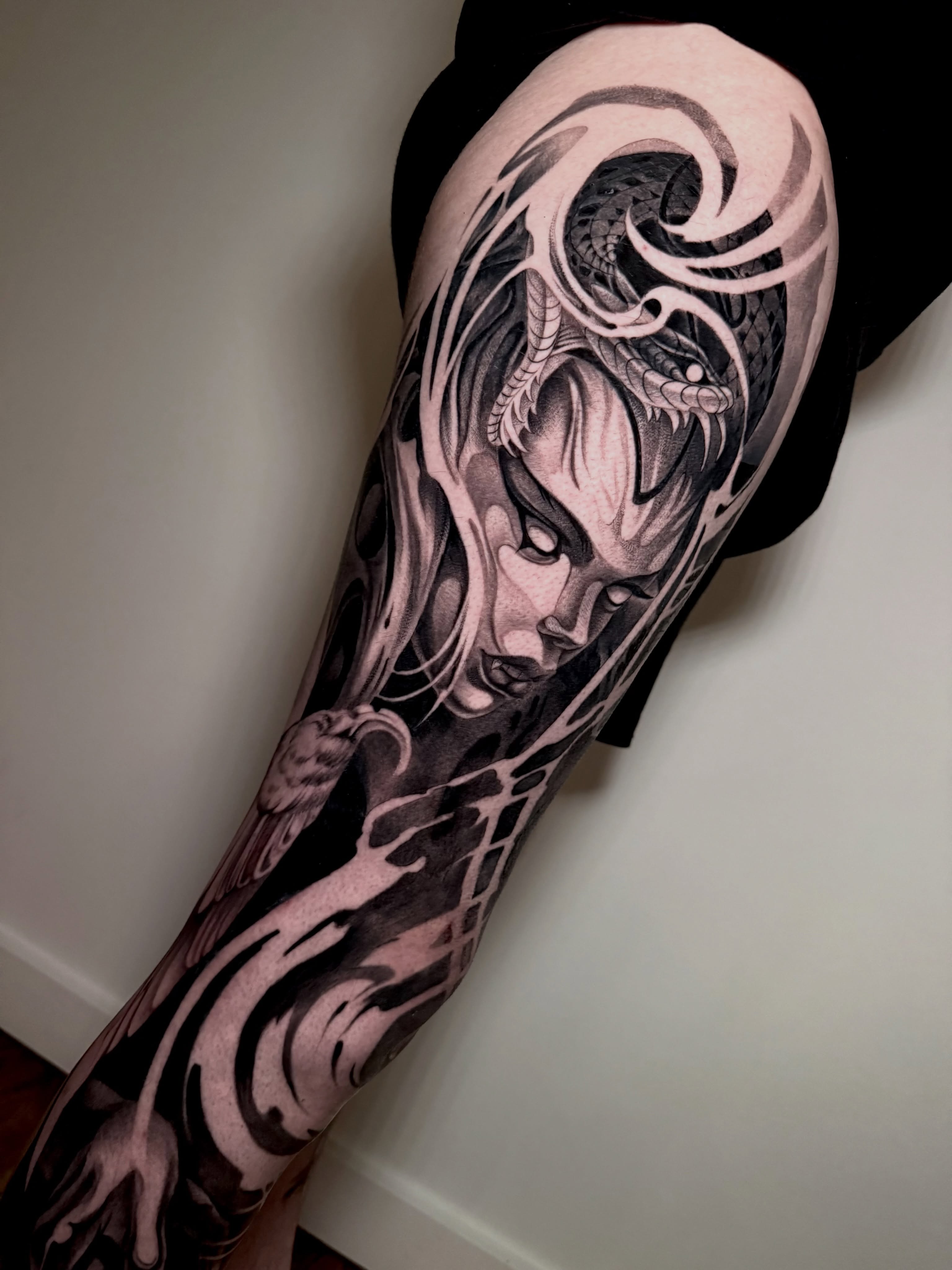 Woman's face realism tattoo on the forearm by Michelle Carlton