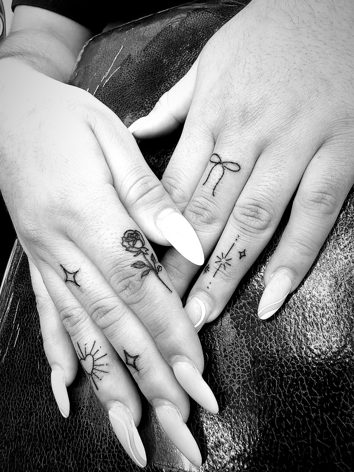 Finger tattoos fine line tattoo on the hand by Kraken ink Tattoo, San Francisco, California