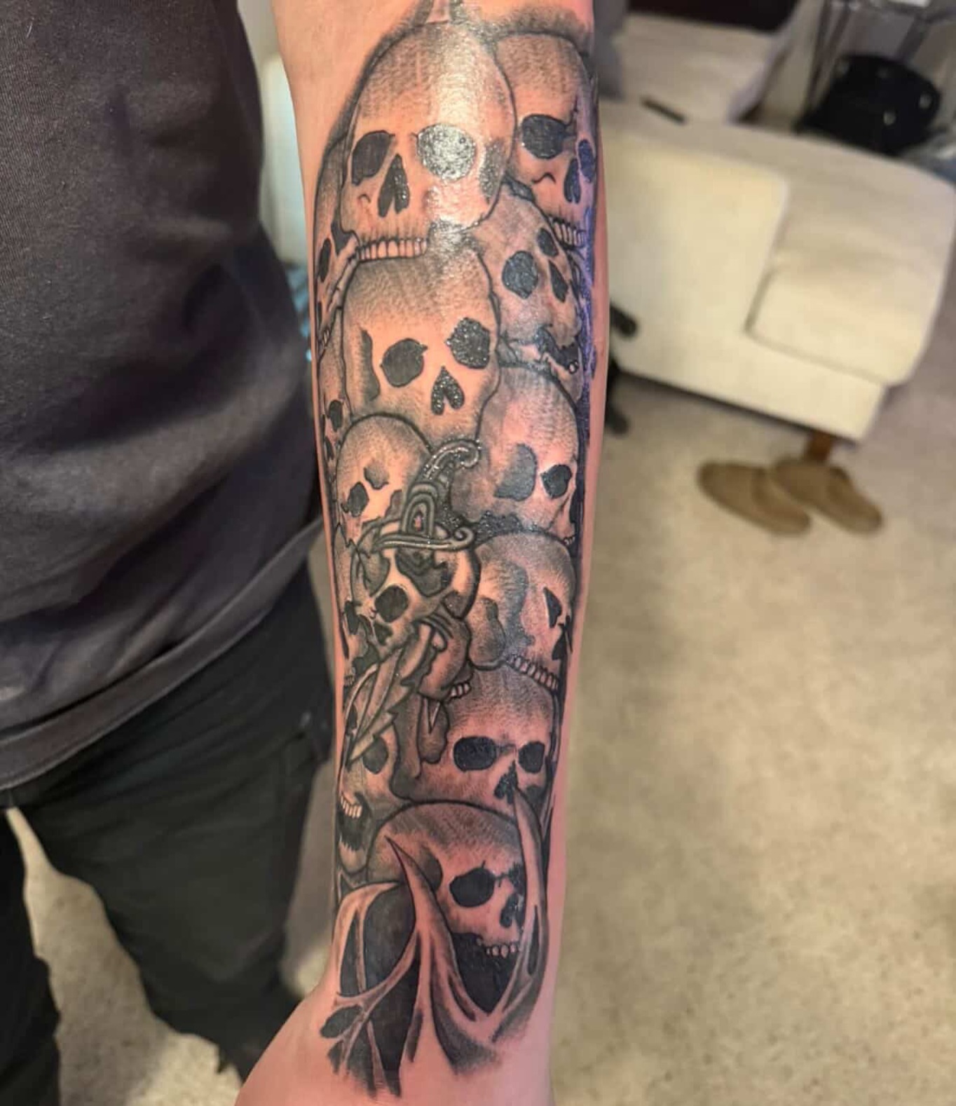 Skulls and anchor realism tattoo on the forearm by @tatzbythadon