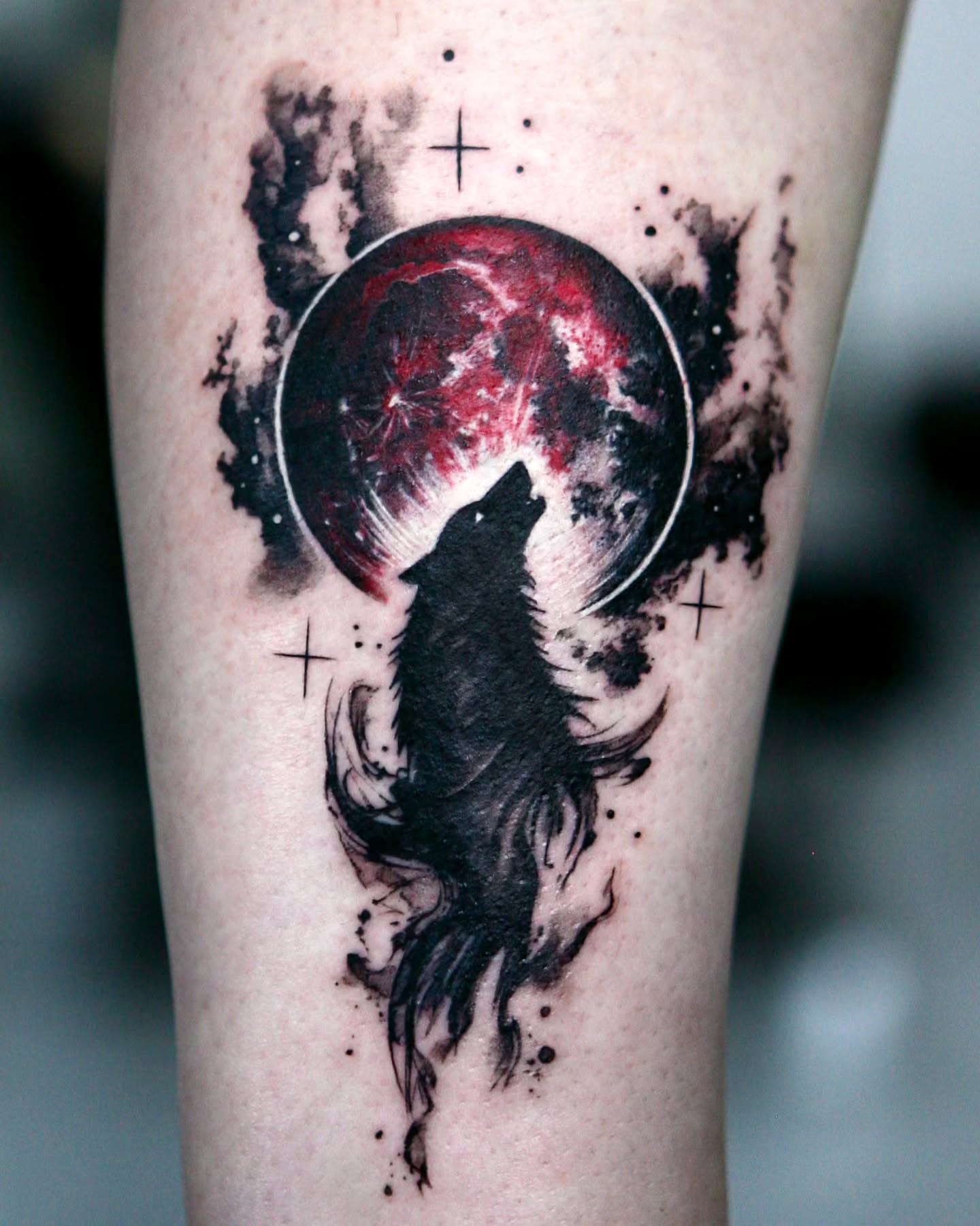 Wolf howling at moon dark realism tattoo on the forearm by danha_seoul tattooist