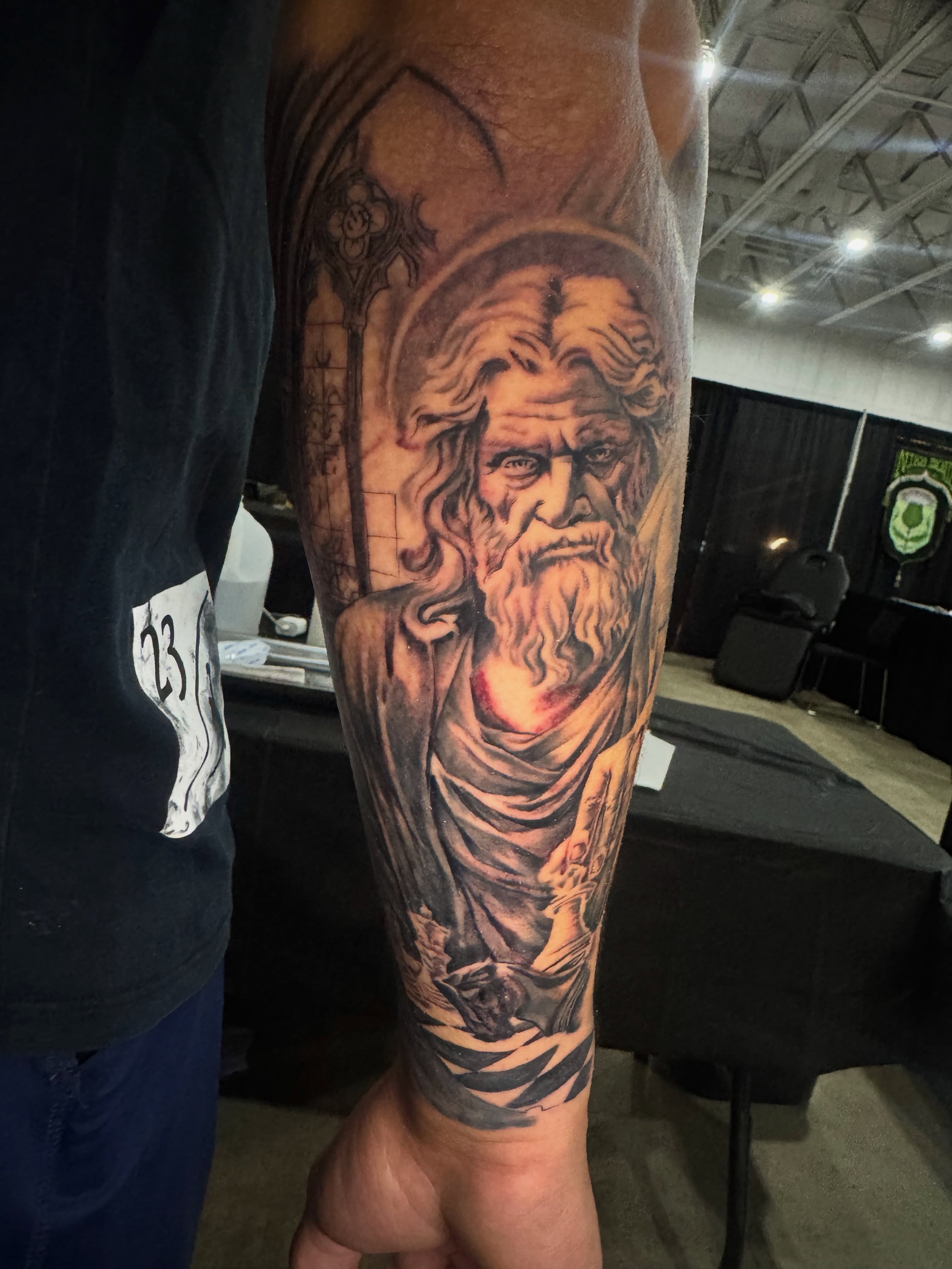 Tattoo by @focused_ink — realism, black_and_grey