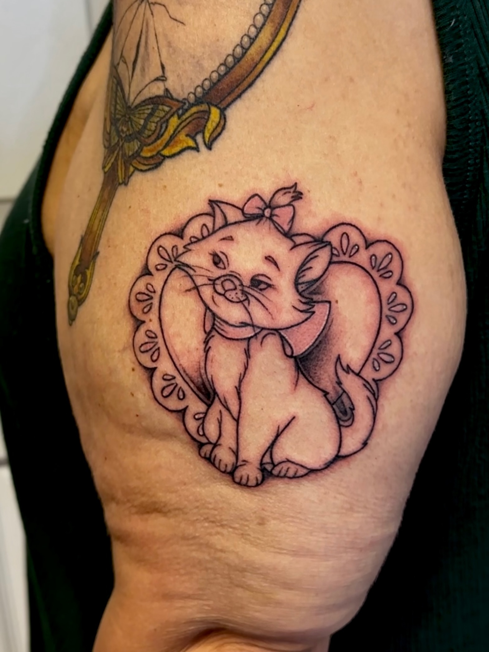 Cat dotwork tattoo on the thigh by Jocelyn