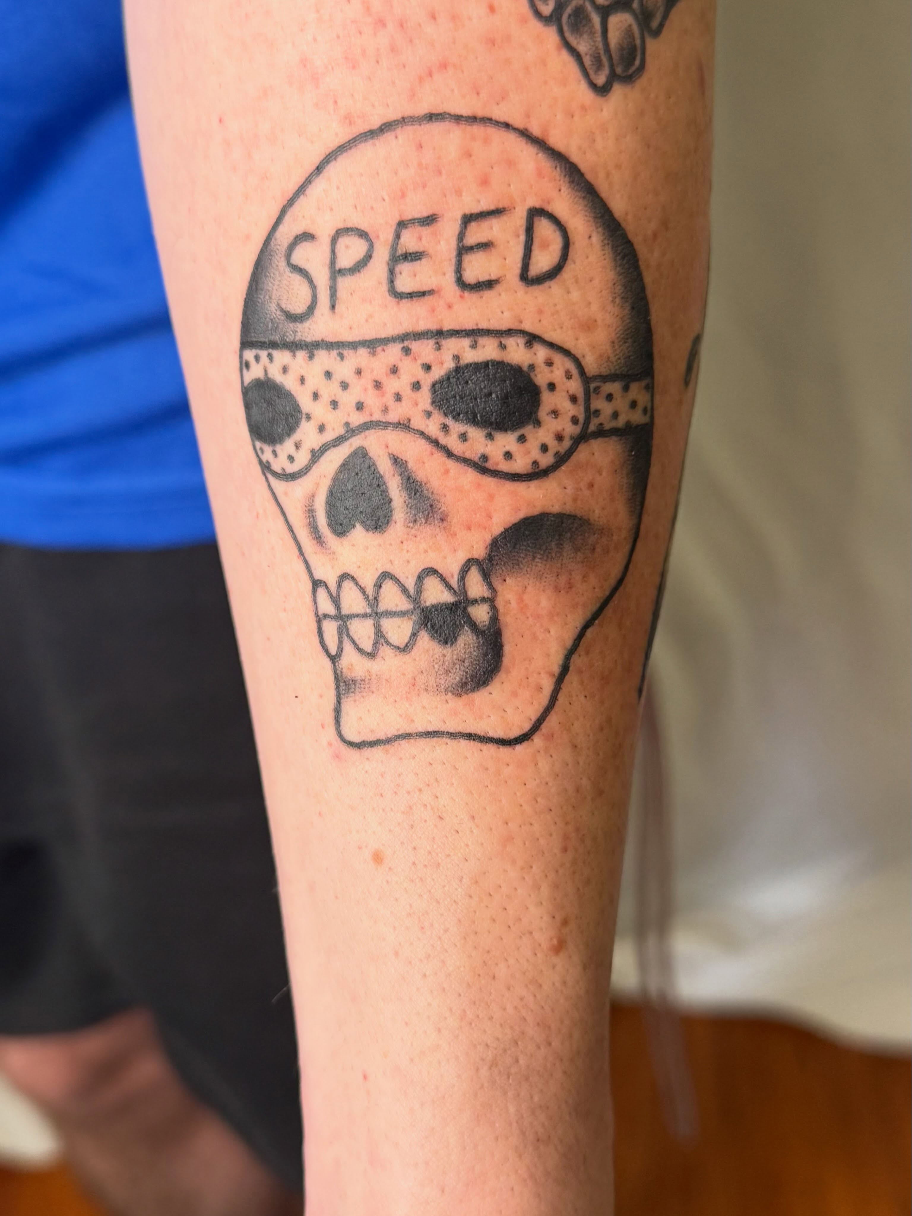 Skull with goggles dotwork tattoo on the forearm by Elmer Lethco