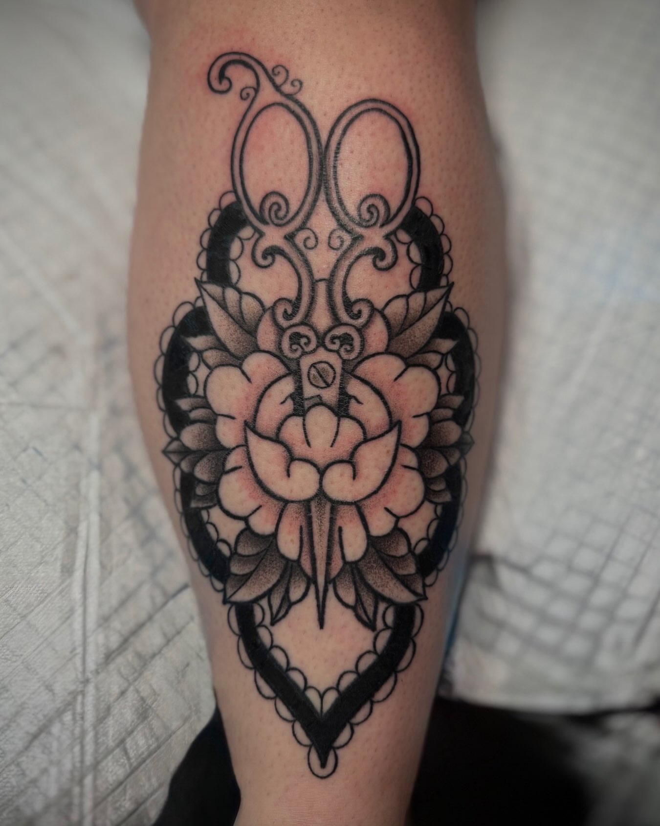 Lotus flower black and grey tattoo on the forearm by zoie rozay hannah