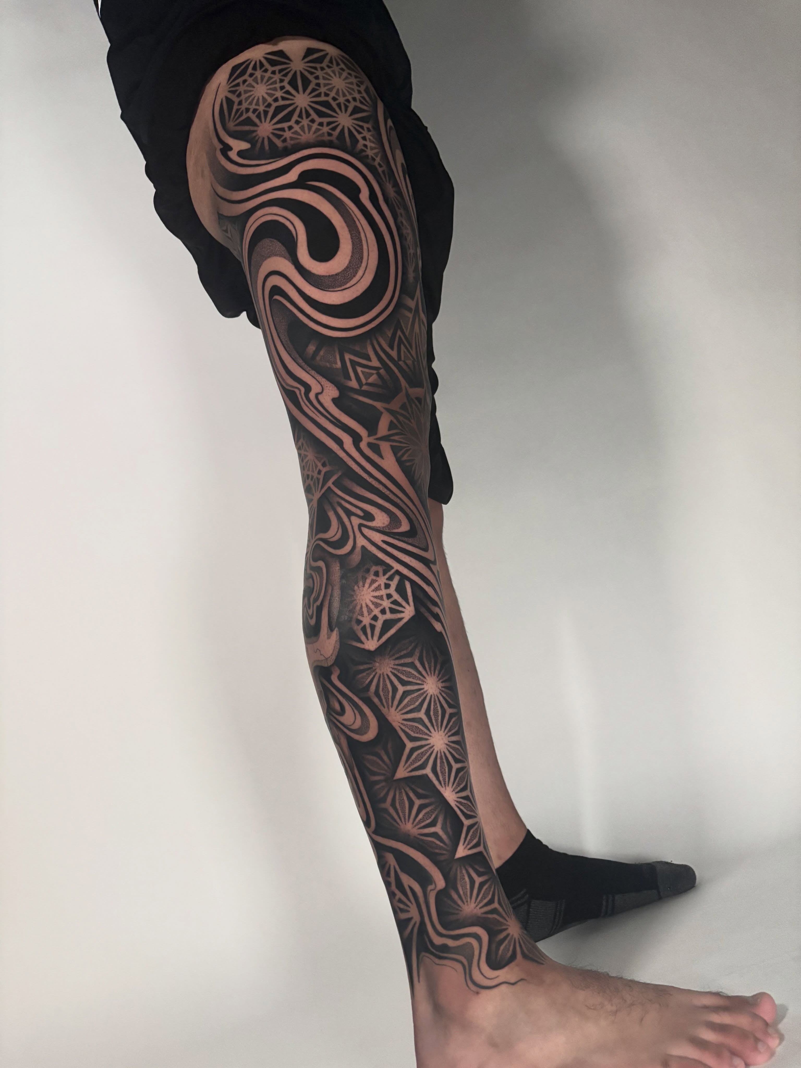 Tattoo by @mitchin.tattoos — geometric, black_and_grey
