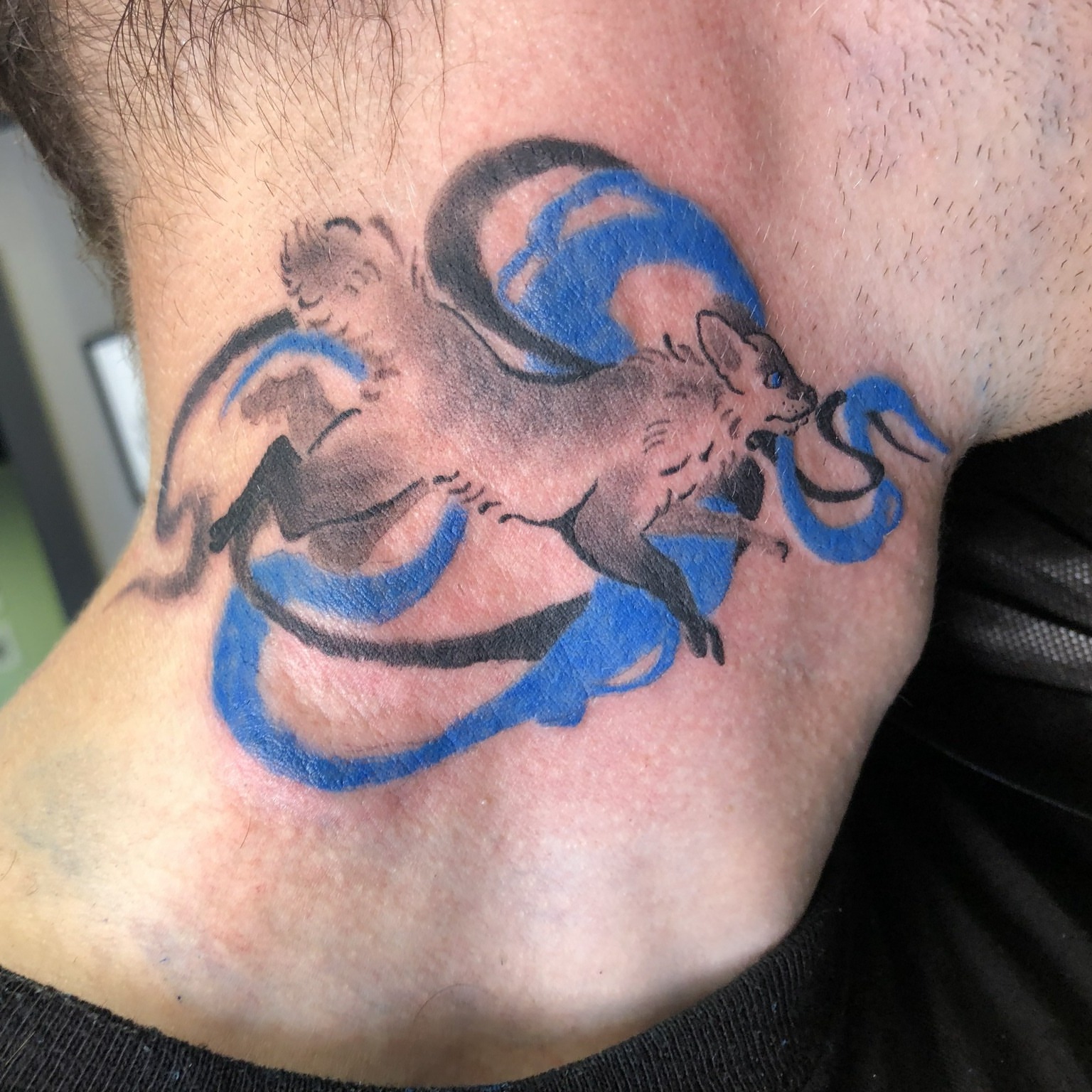 Fox and ram American traditional tattoo on the neck by Rowan Lee