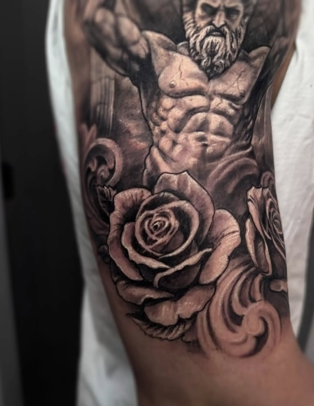Tattoo by @tokarev_igor_tattoo — realism, black_and_grey