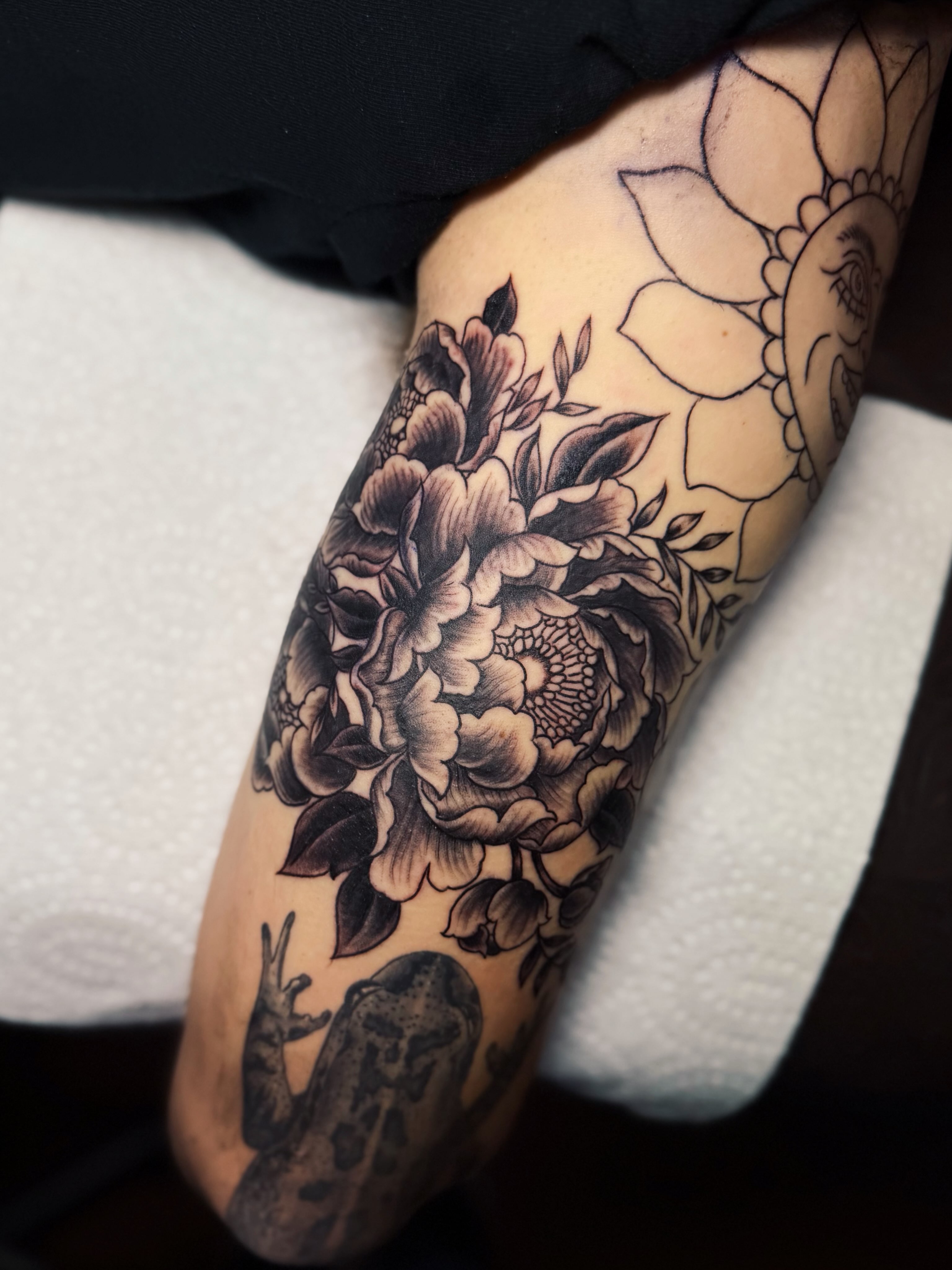 Peony flowers black and grey tattoo on the forearm by @amandahowtattoo