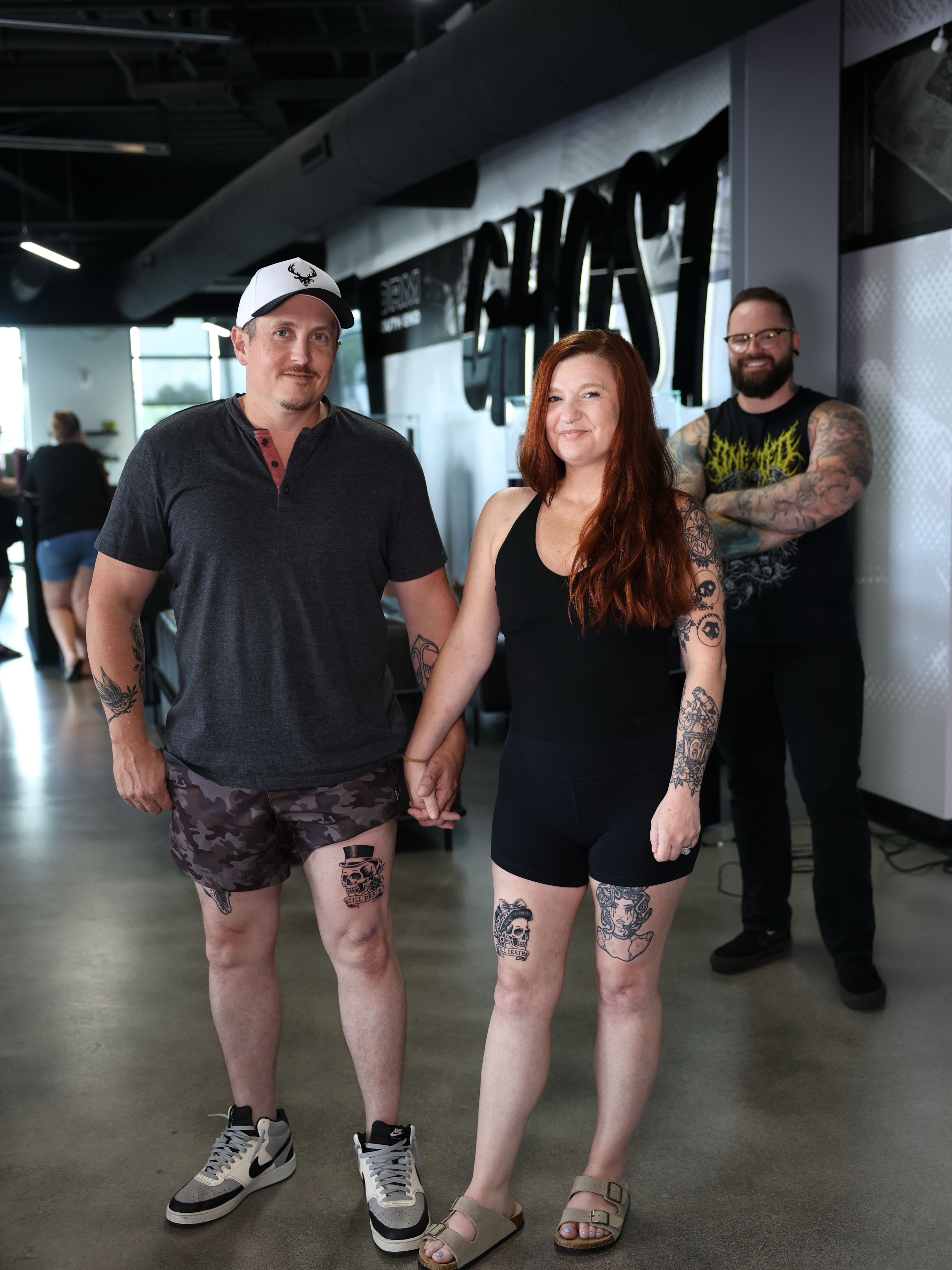 Tattooed couple American traditional tattoo on the thigh by Josh Brownell