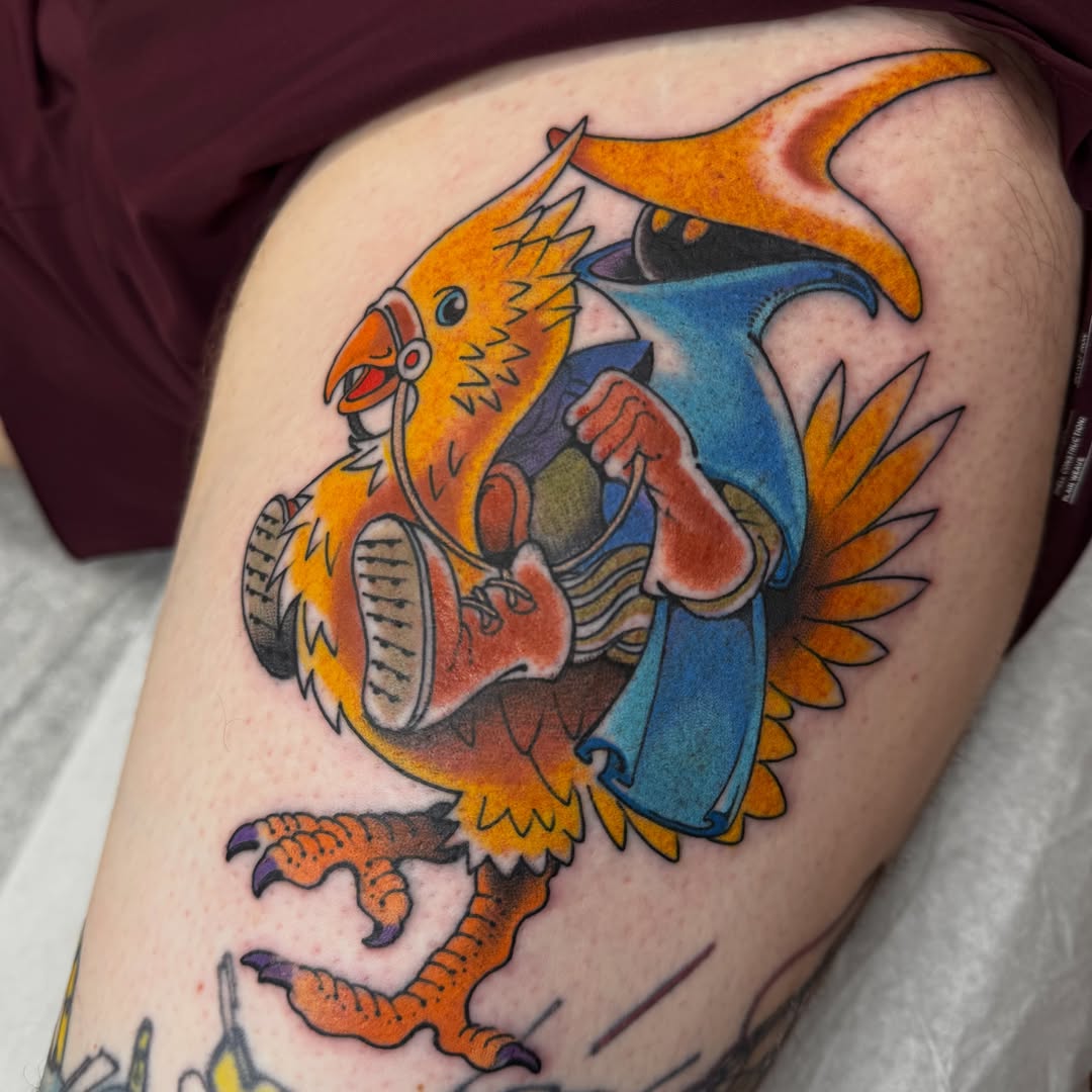 Dragon American traditional tattoo on the thigh by Chris Orta