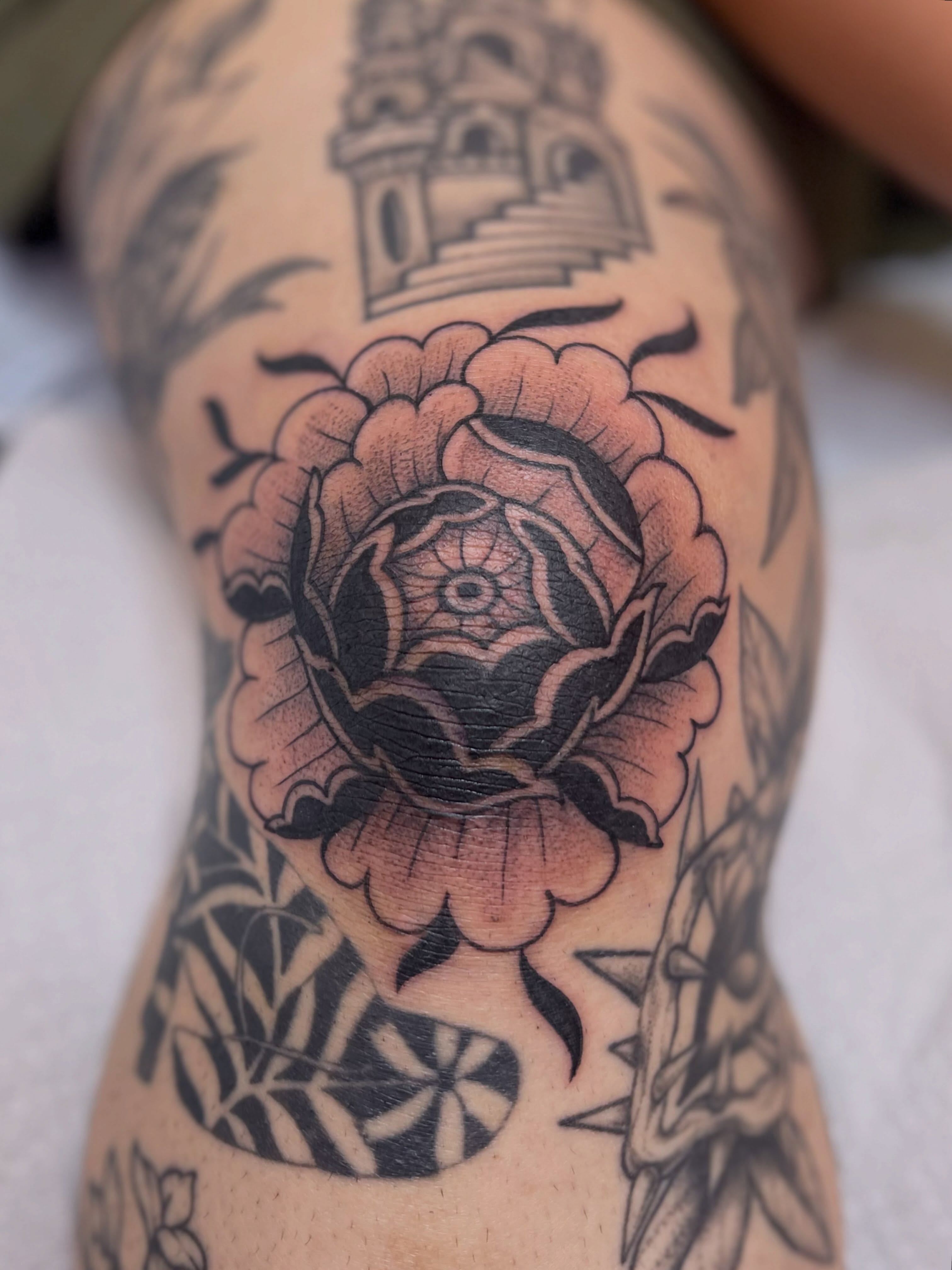 Peony flower American traditional tattoo on the forearm by Dani Di Pietrantonio