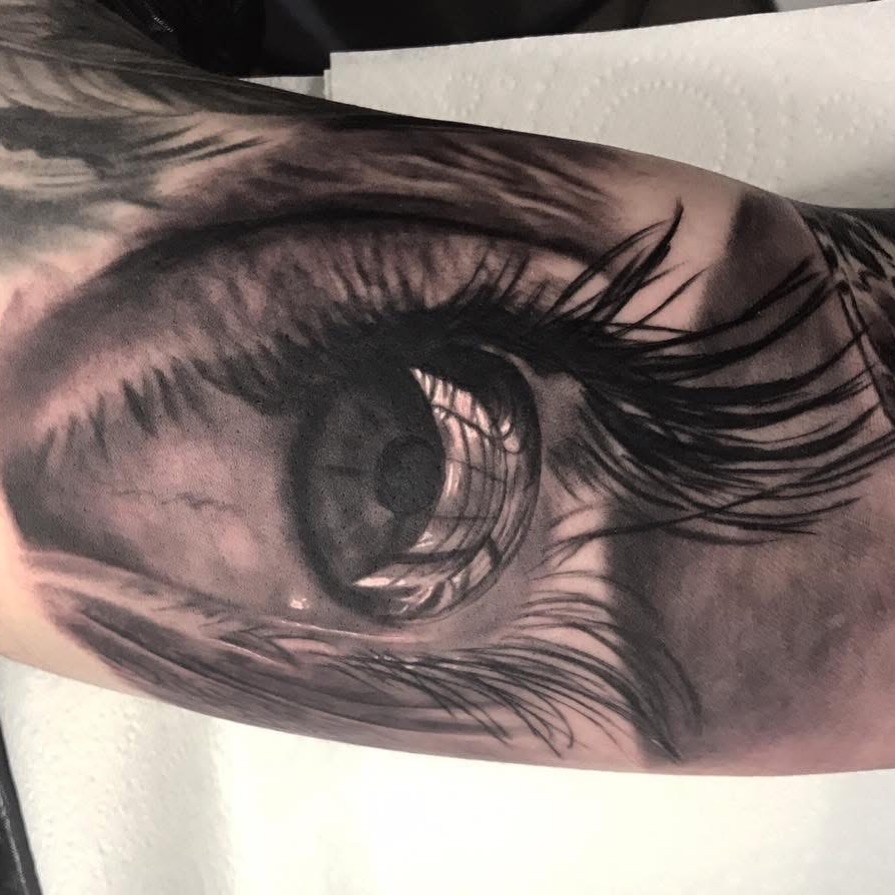 Tattoo by @kaostattooart — realism, black_and_grey