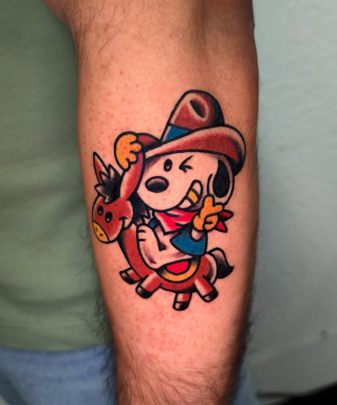 Mickey mouse American traditional tattoo on the forearm by Louie Flores
