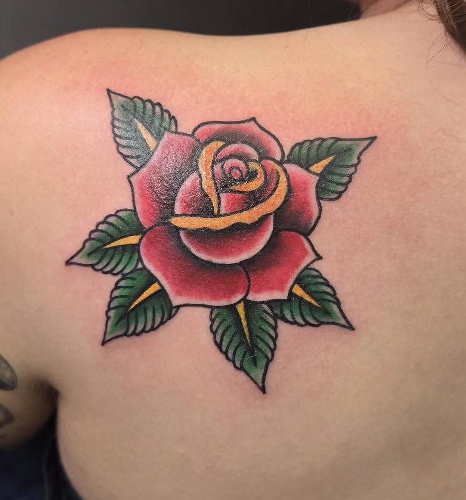 Rose American traditional tattoo on the shoulder by Bryon Smith