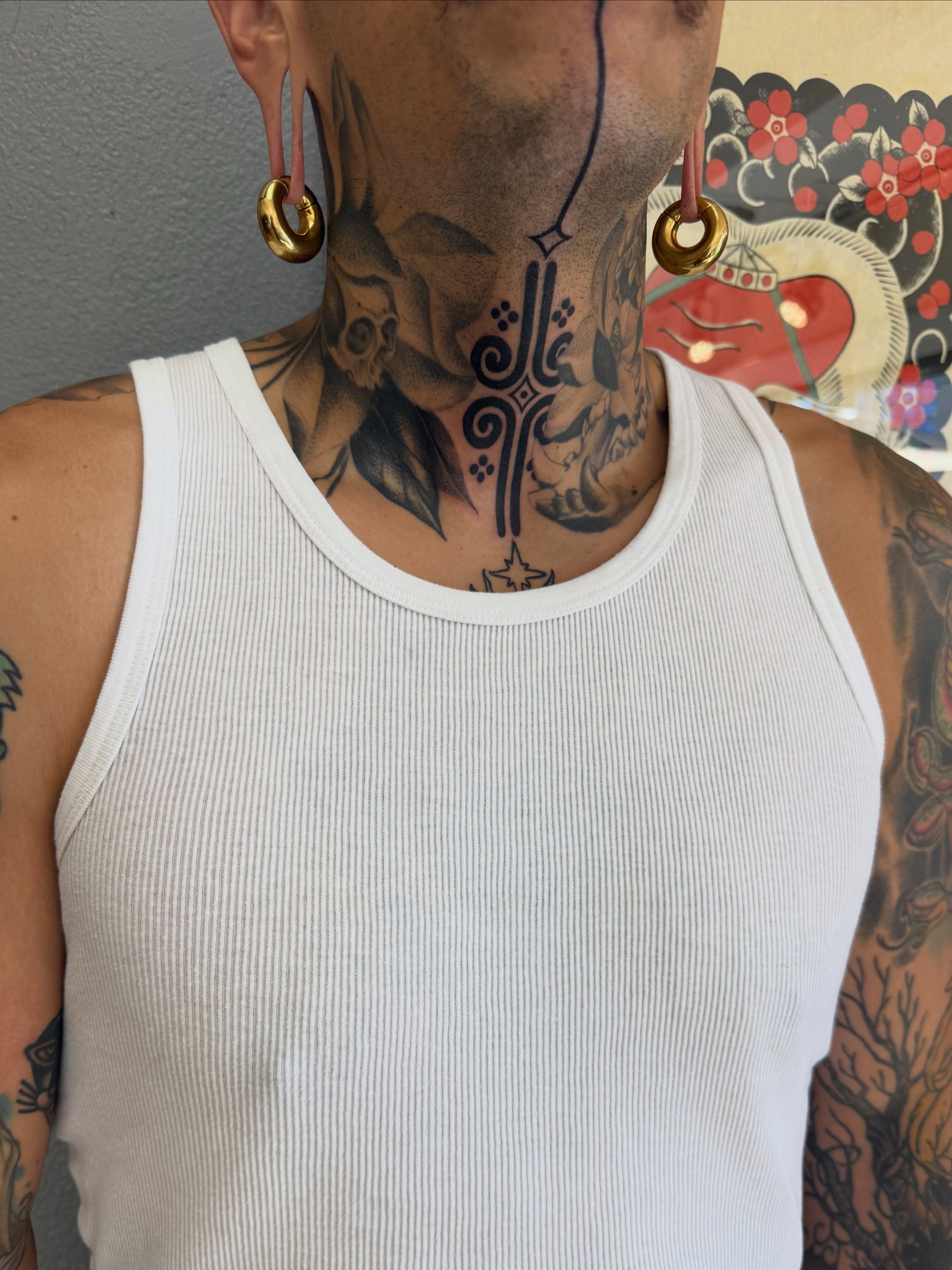 Skull and floral American traditional tattoo on the neck by ᴋᴀᴛᴇ ᯽ ᴘᴀᴄɪᴏᴛᴛɪ