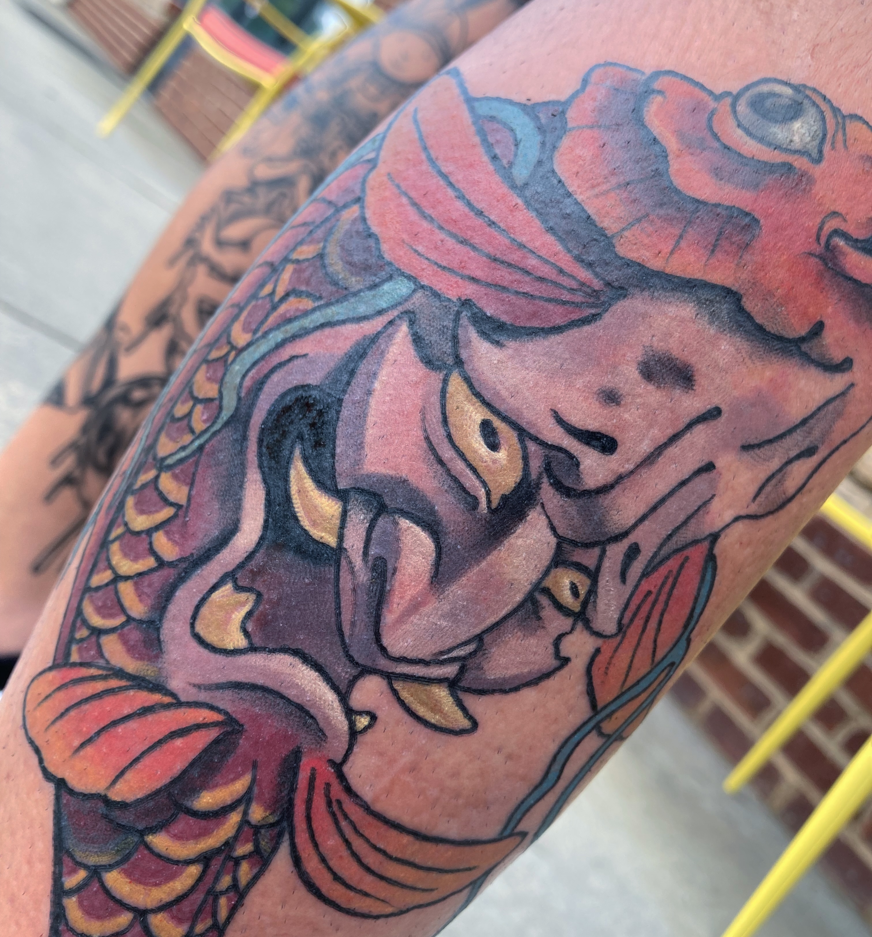 Koi fish American traditional tattoo on the forearm by Eathan Hale-(East TN) Newschool Tattoo Artist