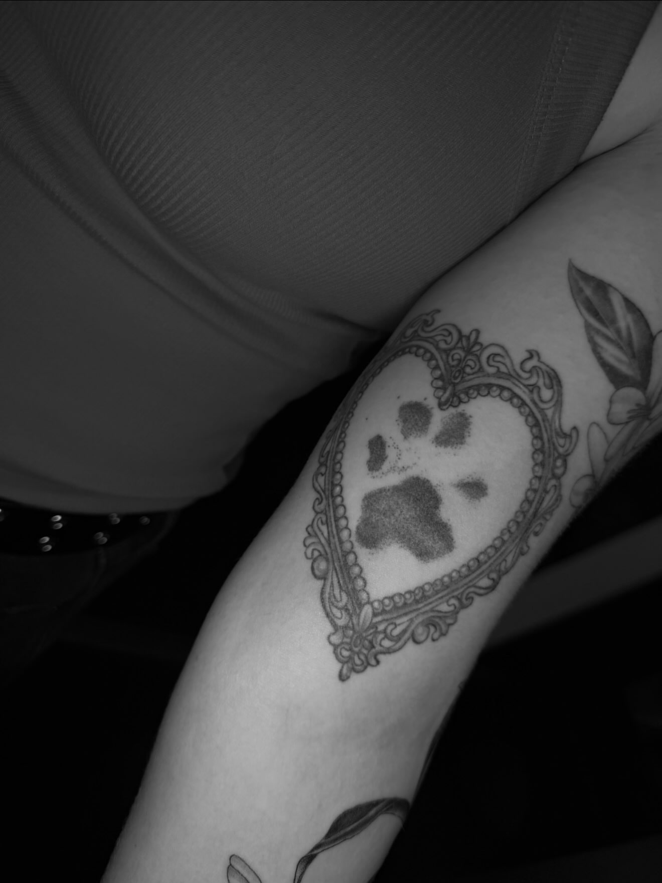Skull with paw print black and grey tattoo on the forearm by Ciera (Ribbit) ๐ธ