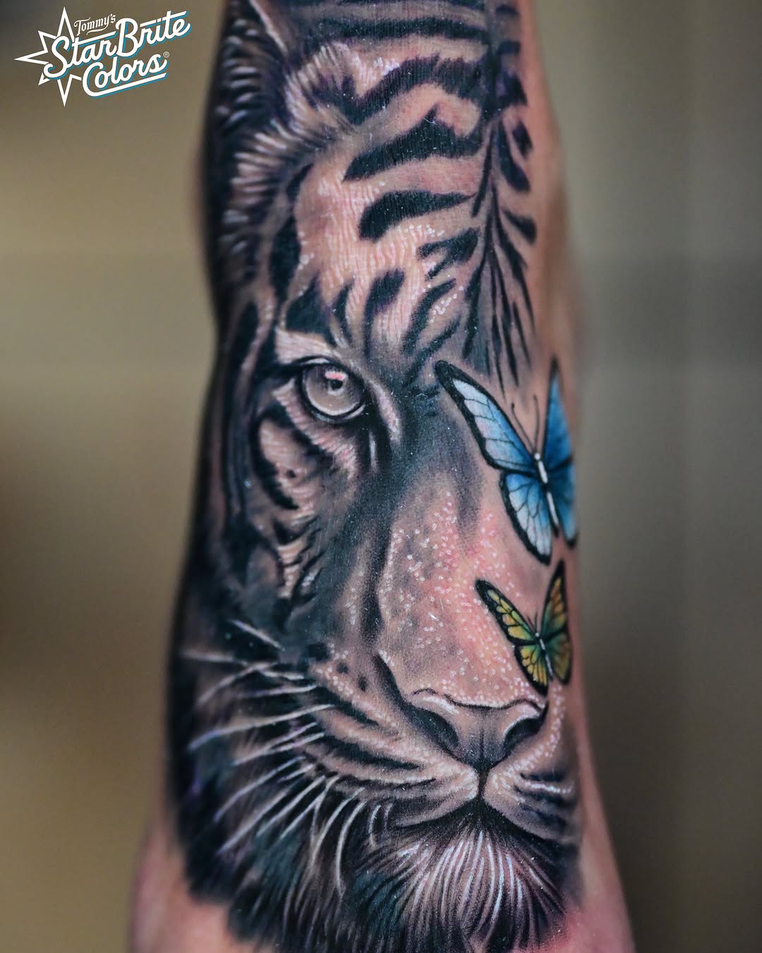 Tiger realism tattoo on the forearm by Sean OHara
