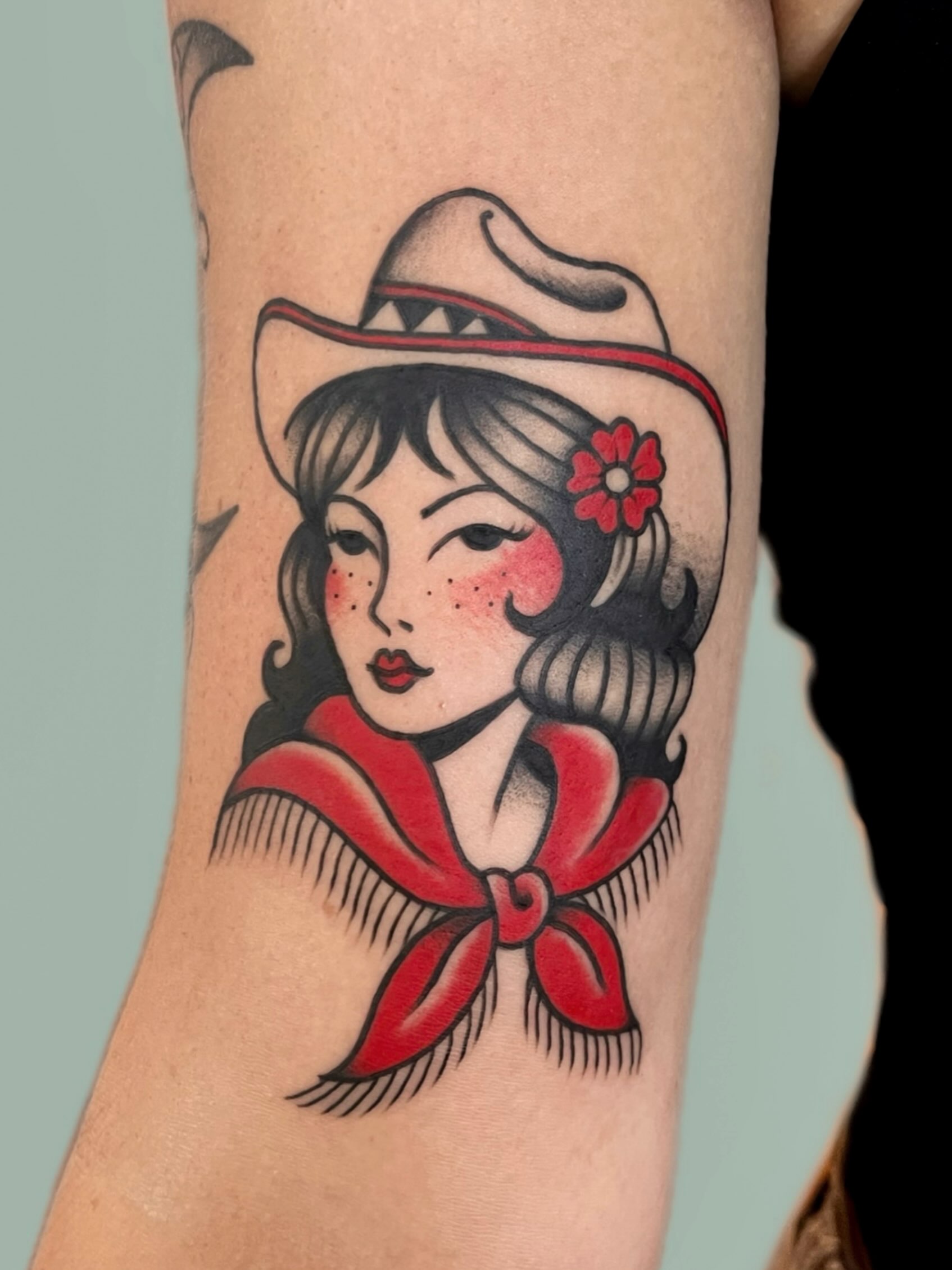 Cowgirl portrait American traditional tattoo on the forearm by nina