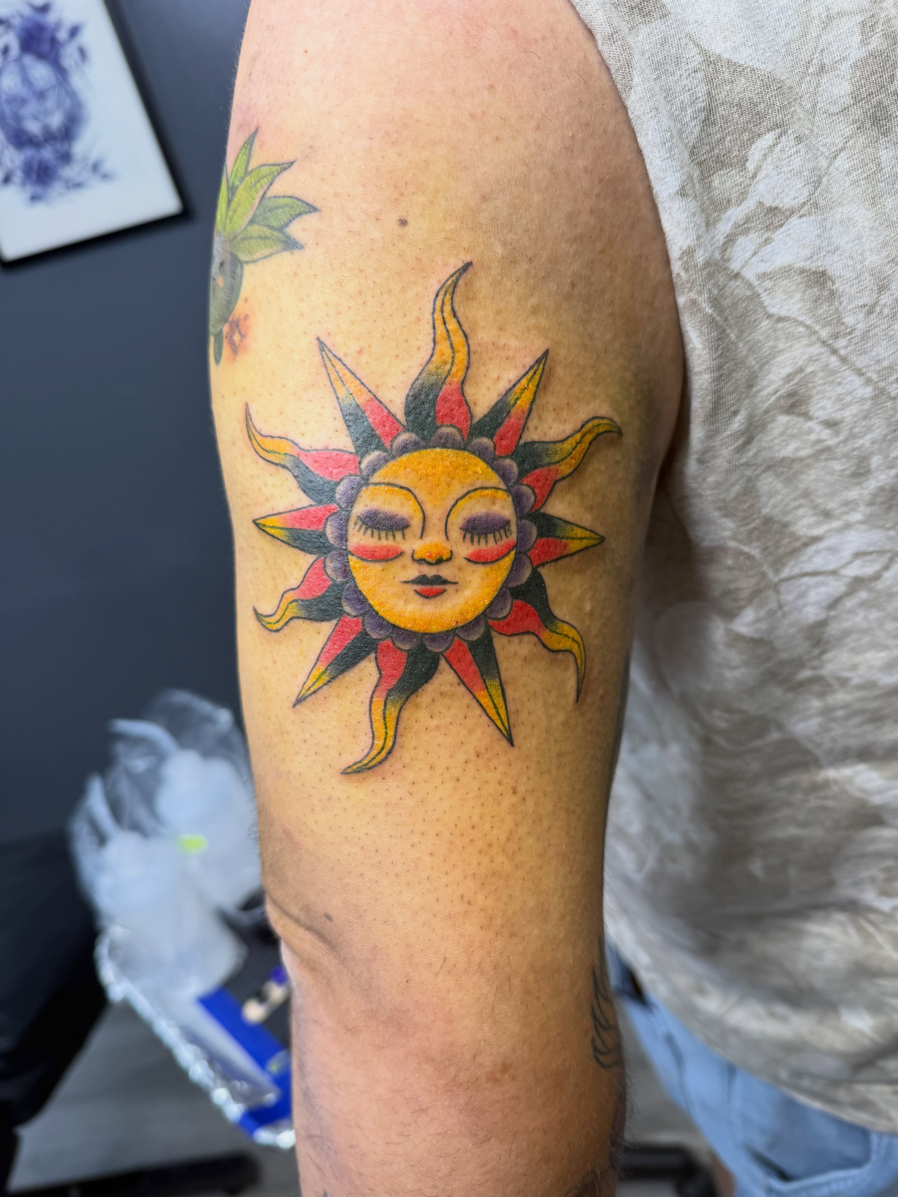 Sun American traditional tattoo on the forearm by Liz🗡️Fort Collins🗡️Tattoo Apprentice