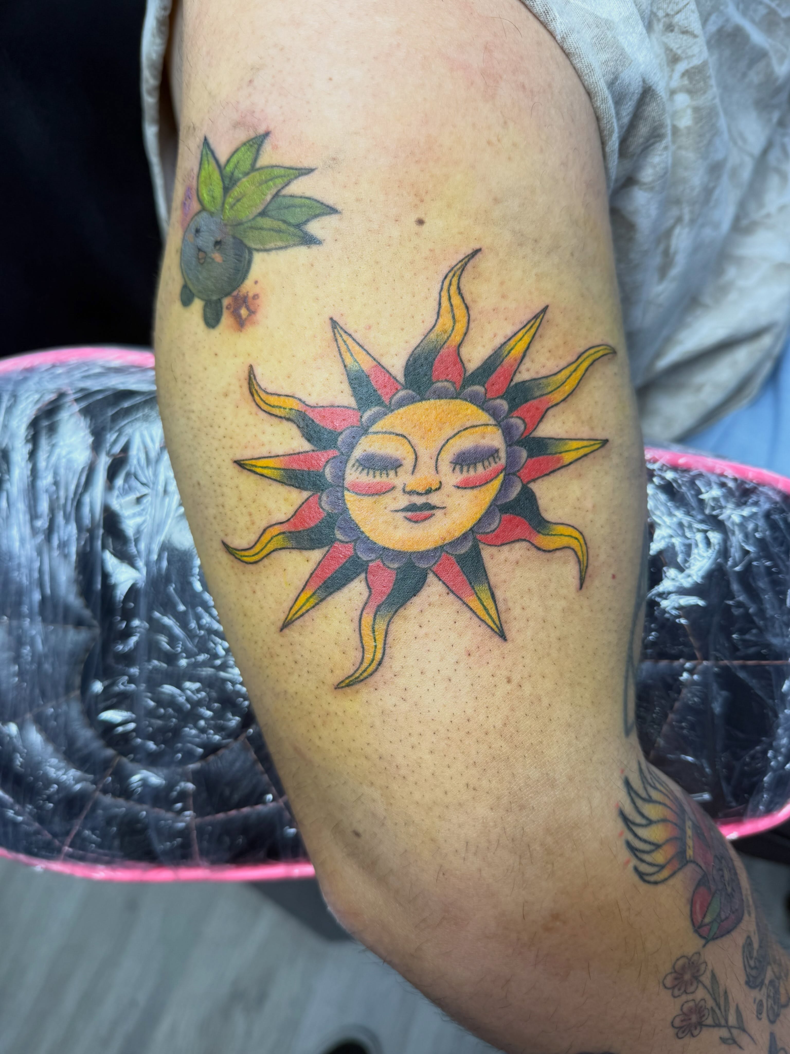 Sun American traditional tattoo on the forearm by Liz🗡️Fort Collins🗡️Tattoo Apprentice