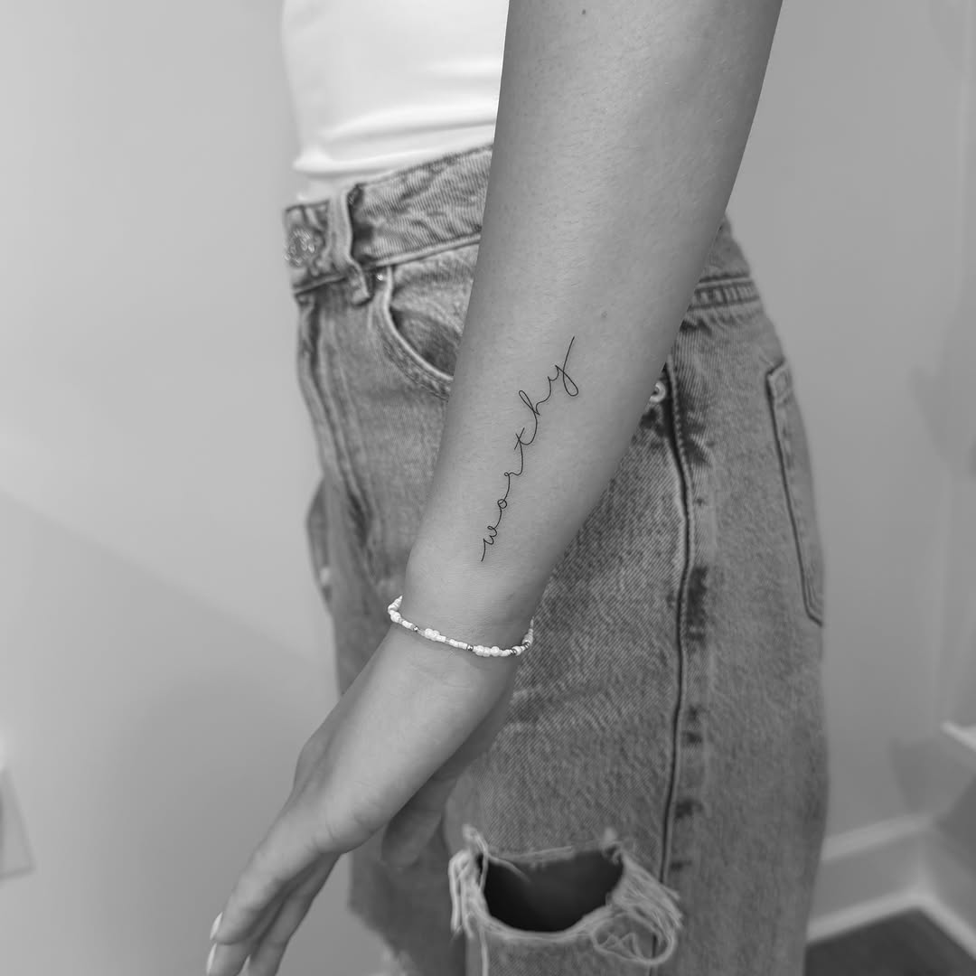 Worthy lettering script tattoo on the forearm by Jessica, Cheektowaga, New York