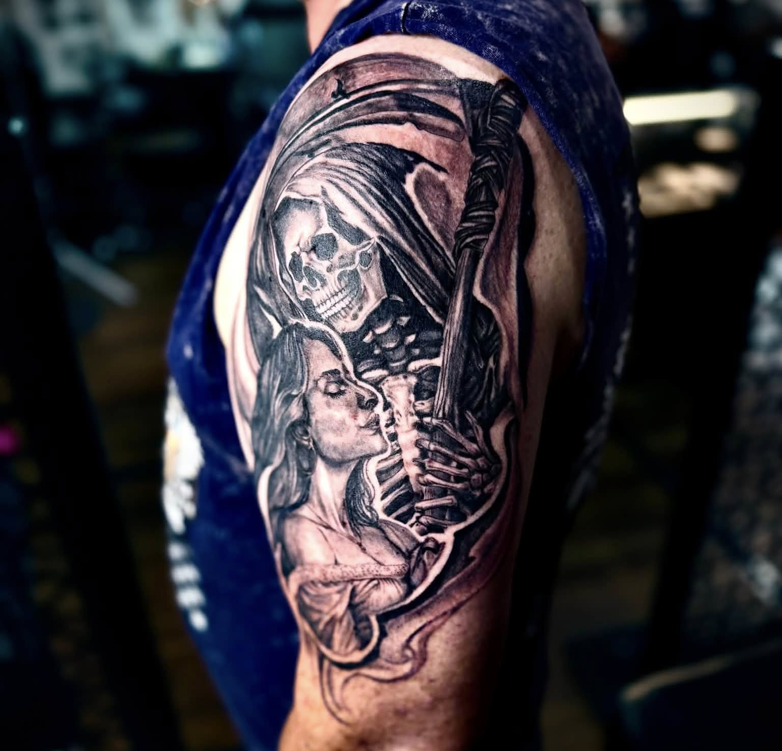 Death and life realism tattoo on the upper arm by Tattoo Artist Ian Day (Everlasting_Art_Ink)