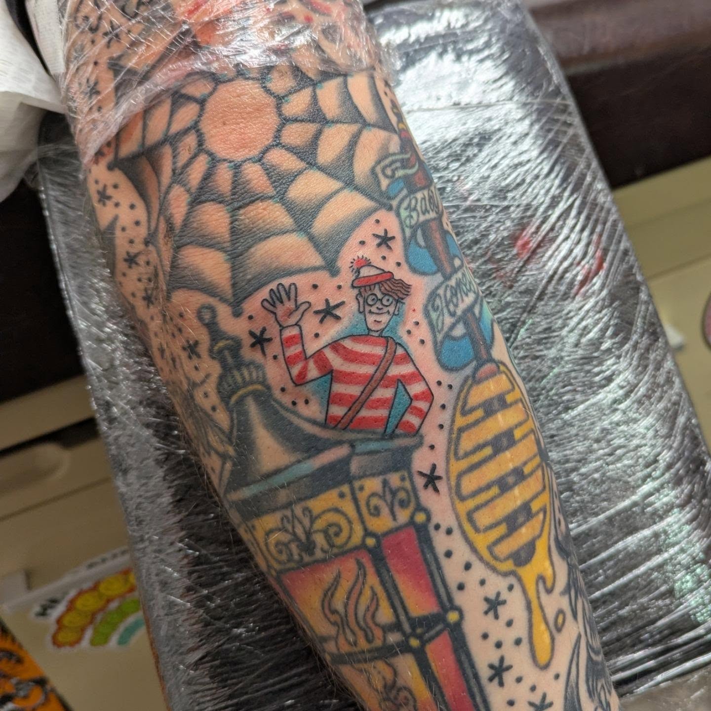Where's Waldo? American traditional tattoo on the forearm by Ryan Slegel
