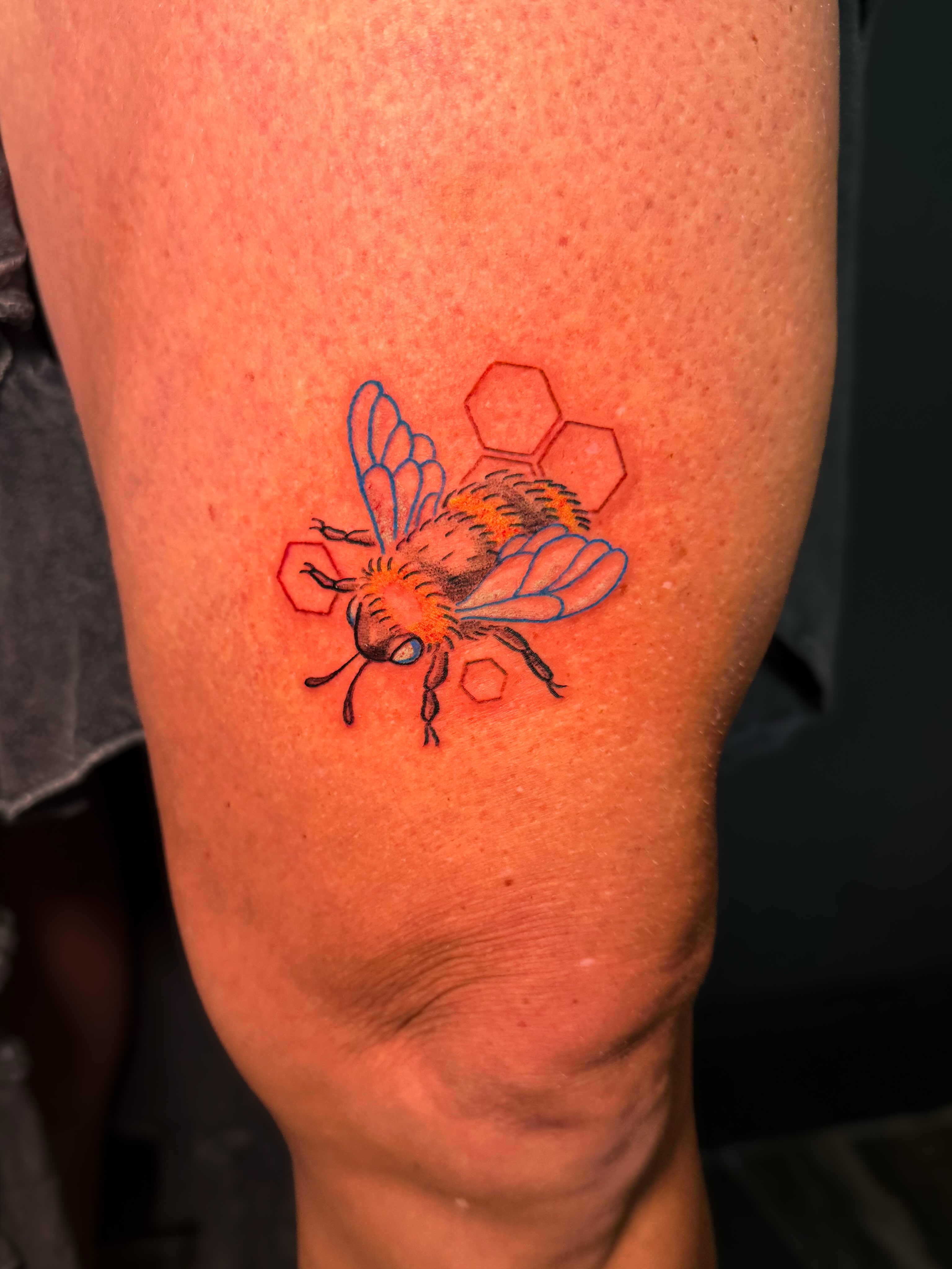 Bee geometric tattoo on the thigh by Ivy-Jade Edwards, Memphis, Tennessee