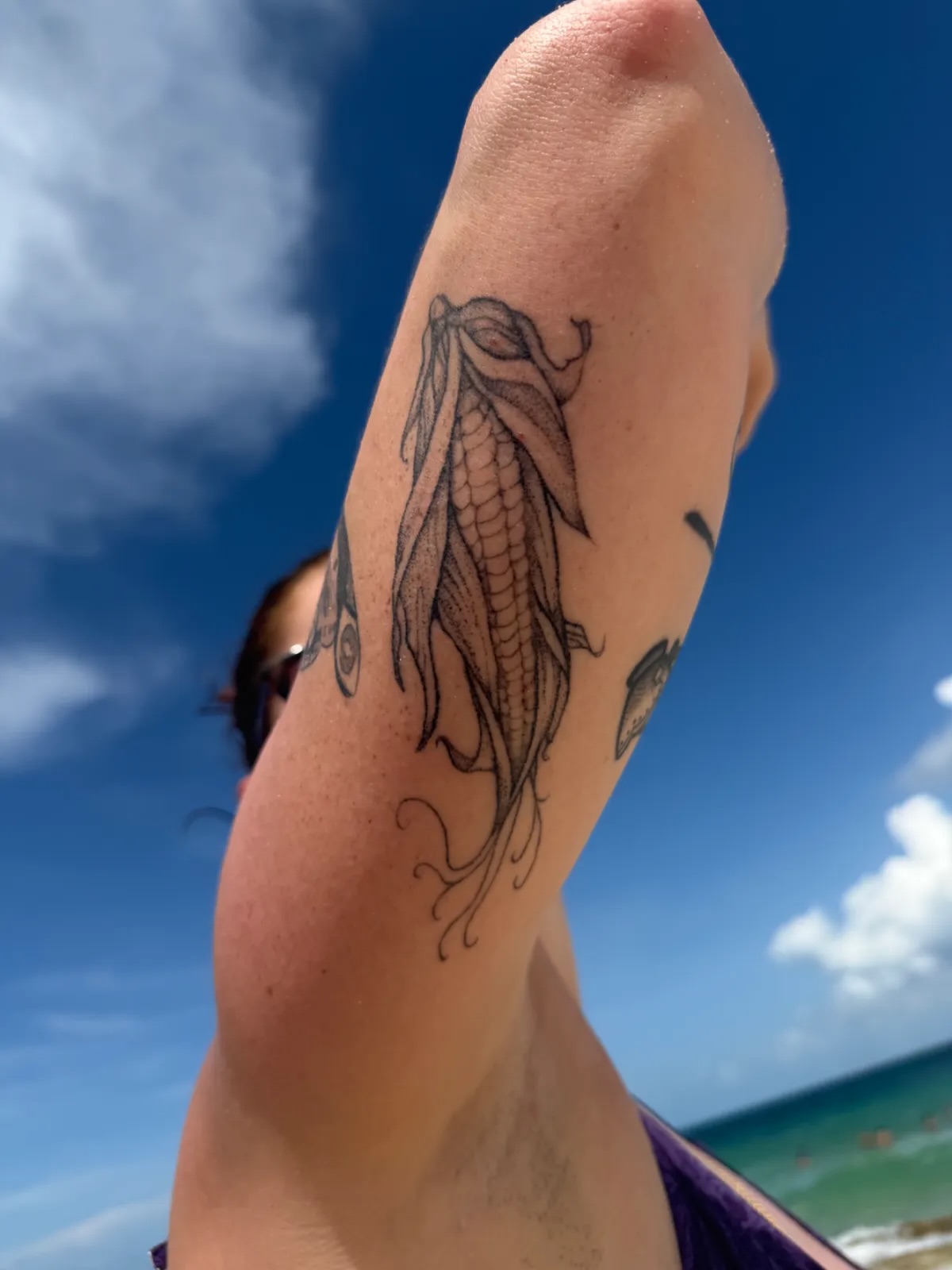 Squid black and grey tattoo on the forearm by Sadie Spades Philly Tattoos