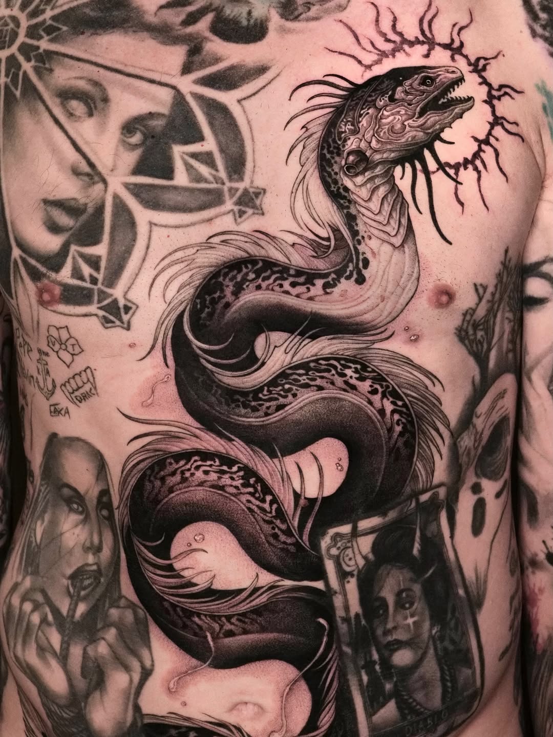Tattoo by @47volt — realism, black_and_grey
