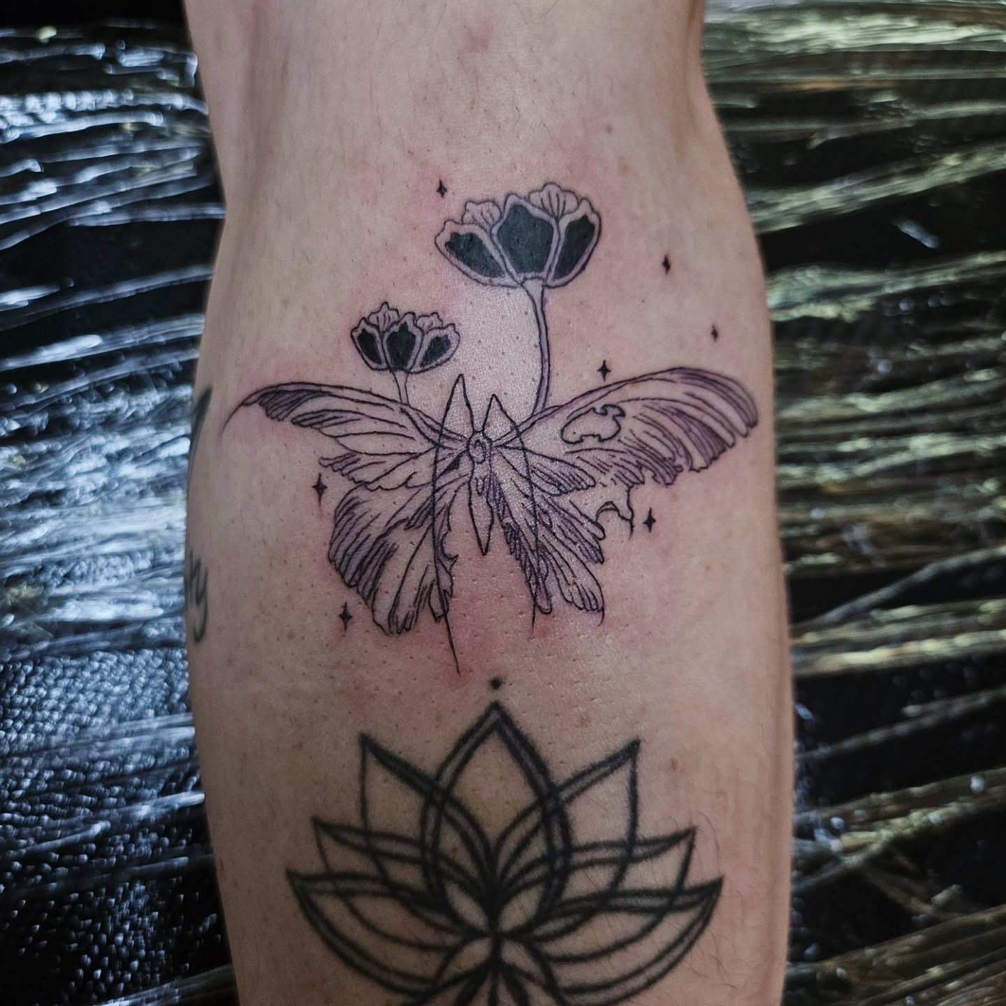 Butterfly and flowers black and grey tattoo on the forearm by ݁˖