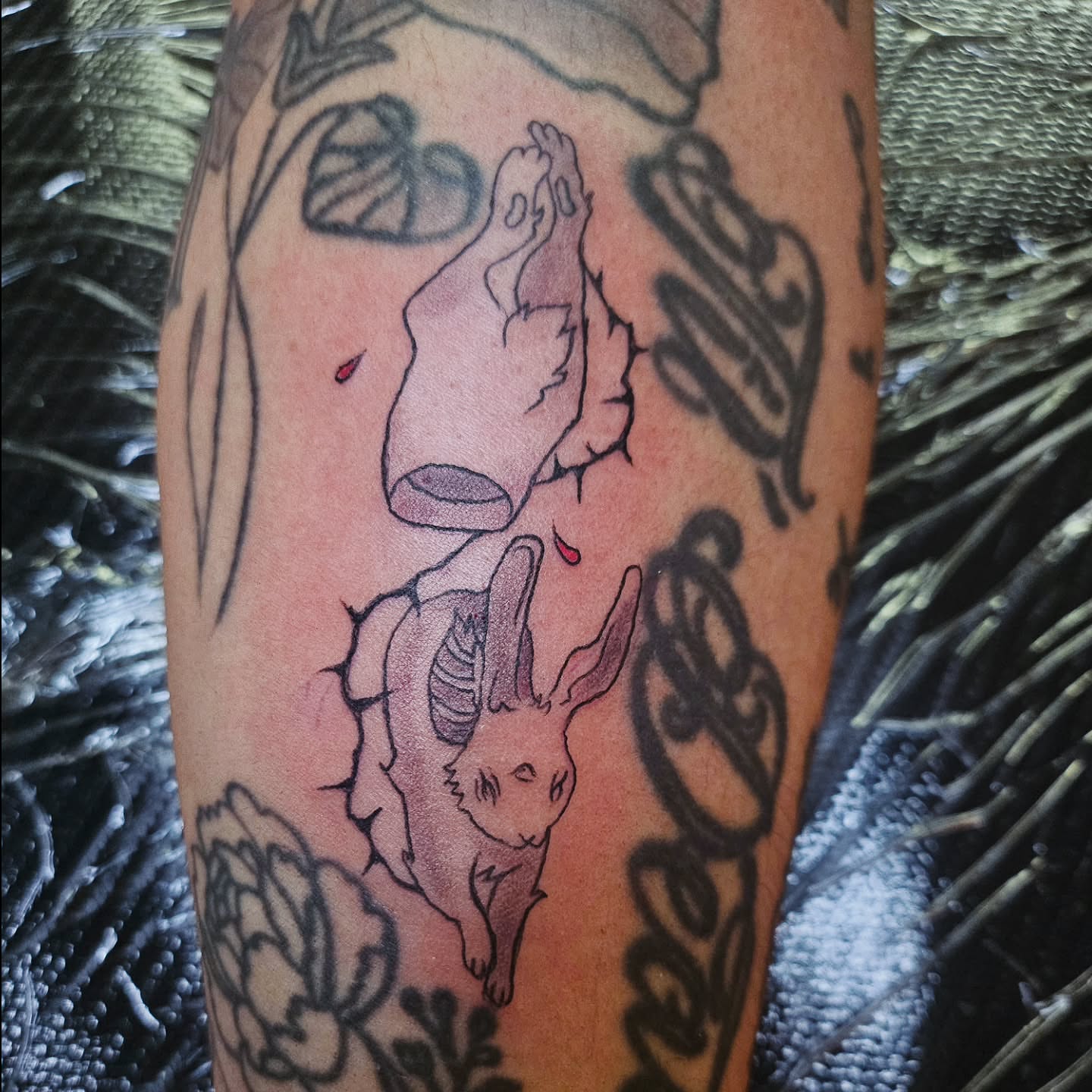 Rabbit and feet black and grey tattoo on the forearm by ݁˖