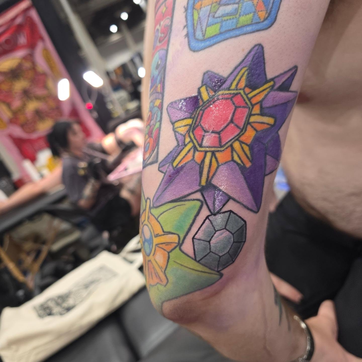 Gemstone geometric tattoo on the forearm by Kayla Williams