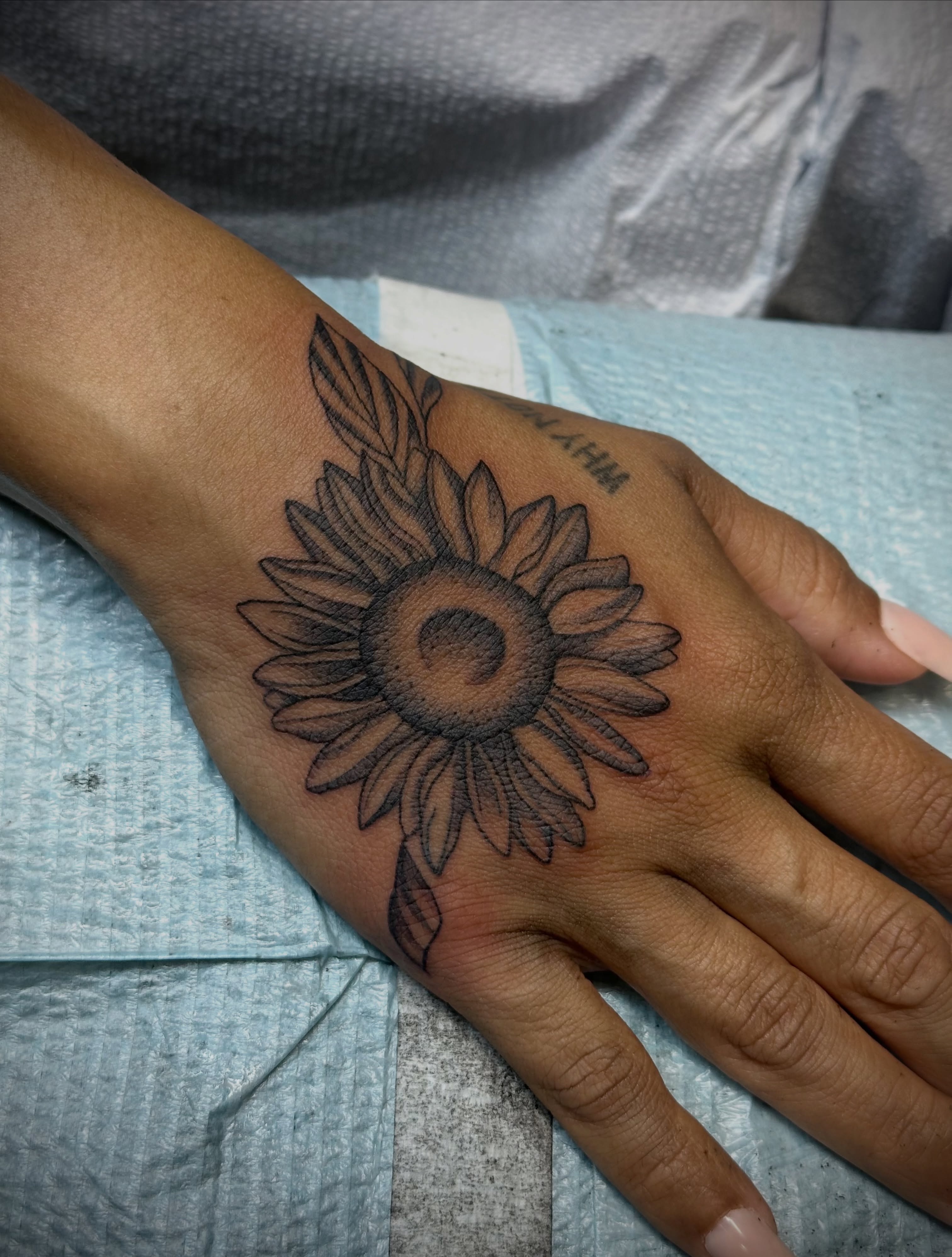 Sunflower black and grey tattoo on the hand by 🥀Chloe Miller
