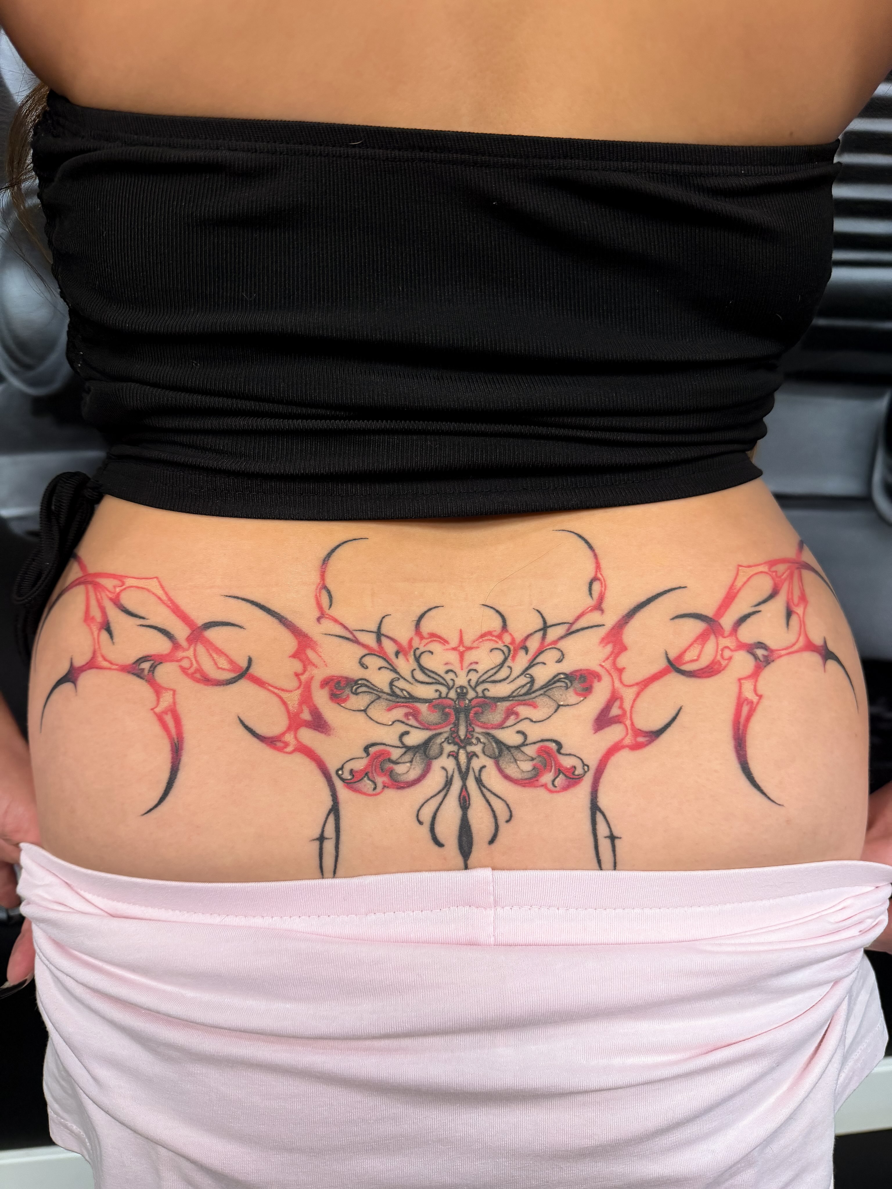 Tribal butterfly tribal tattoo on the torso by Yvonne