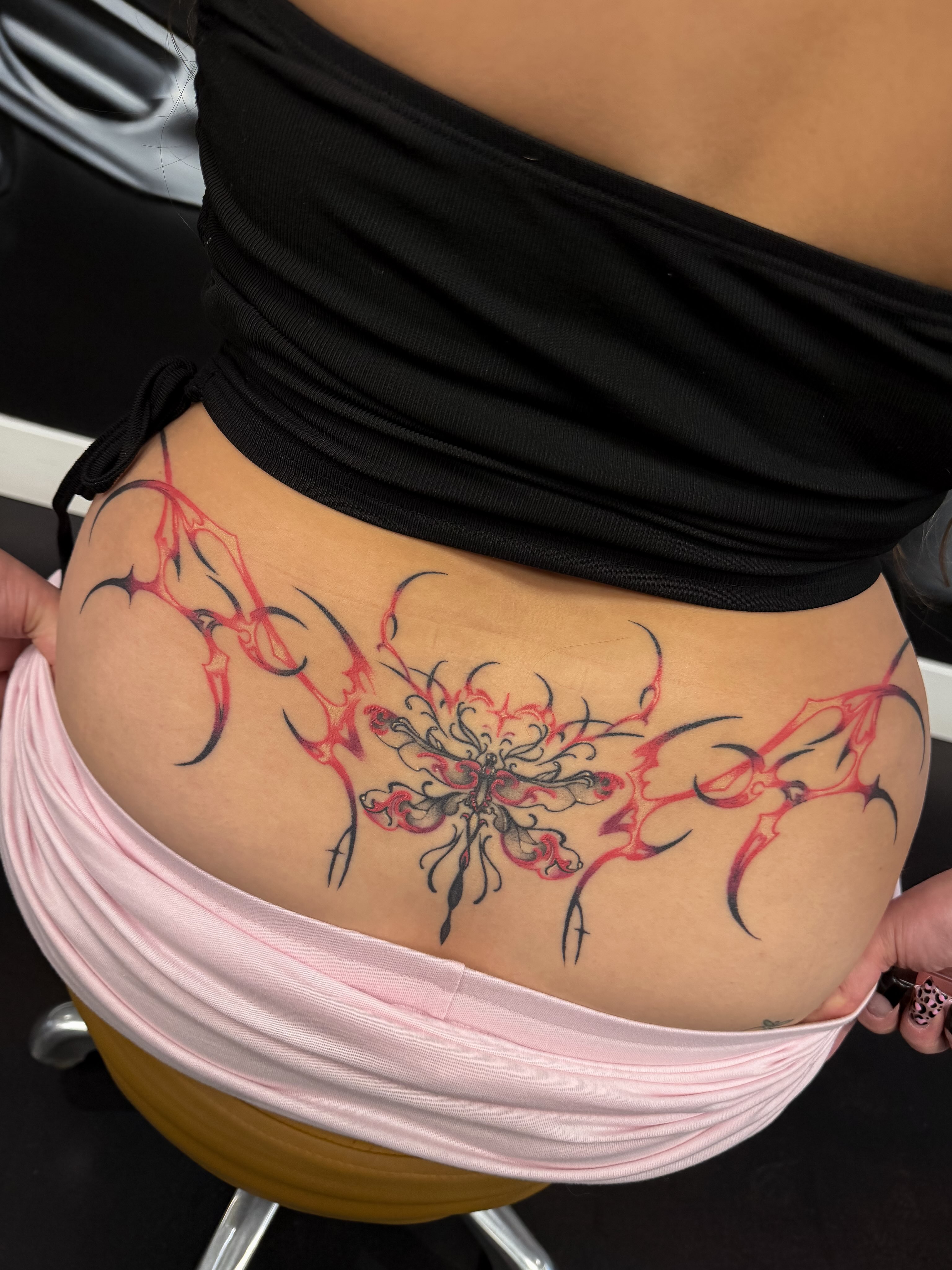 Abstract floral geometric tattoo on the torso by Yvonne