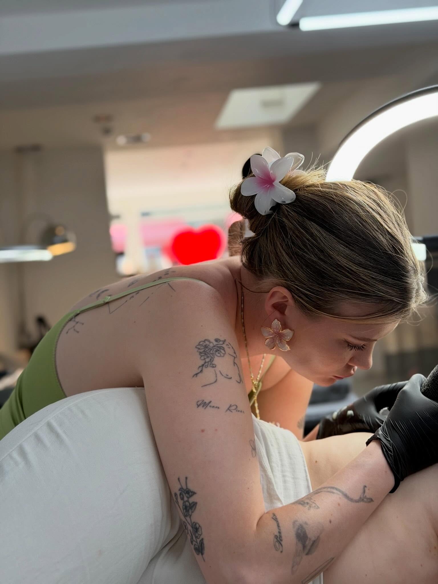 Floral design black and grey tattoo on the shoulder by Ellie