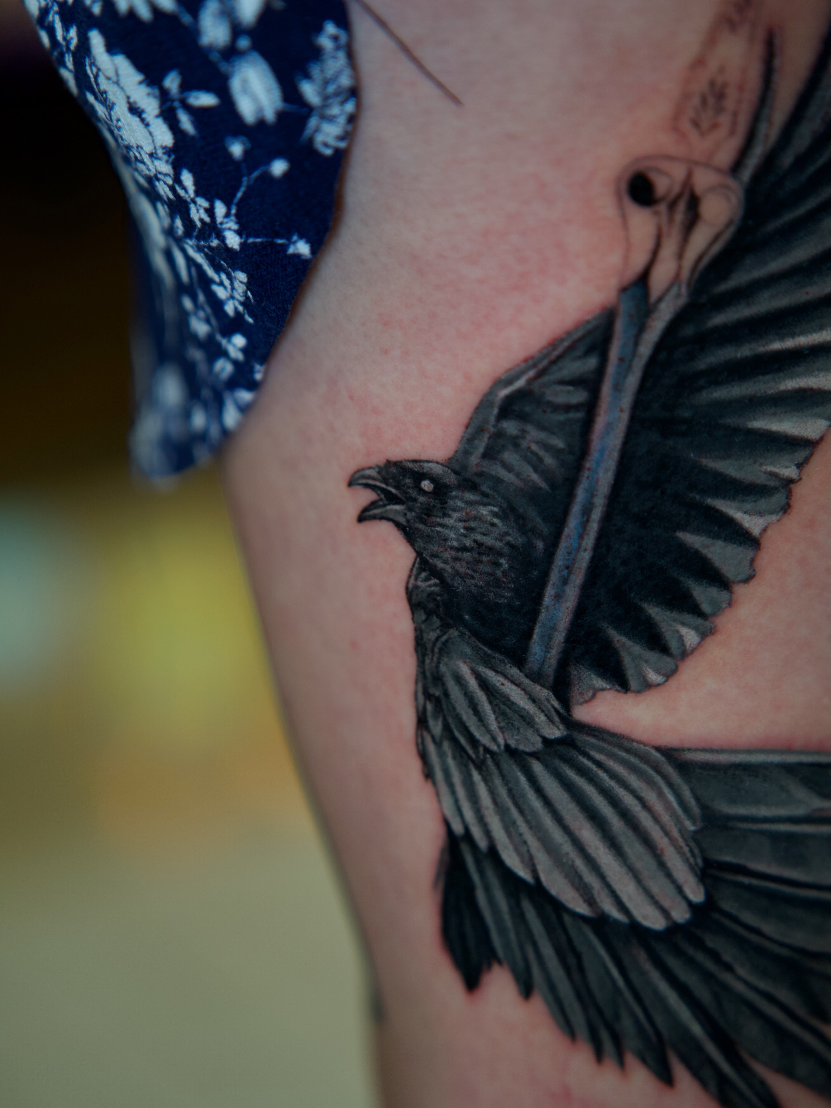 Crow realism tattoo on the forearm by Raven Wood